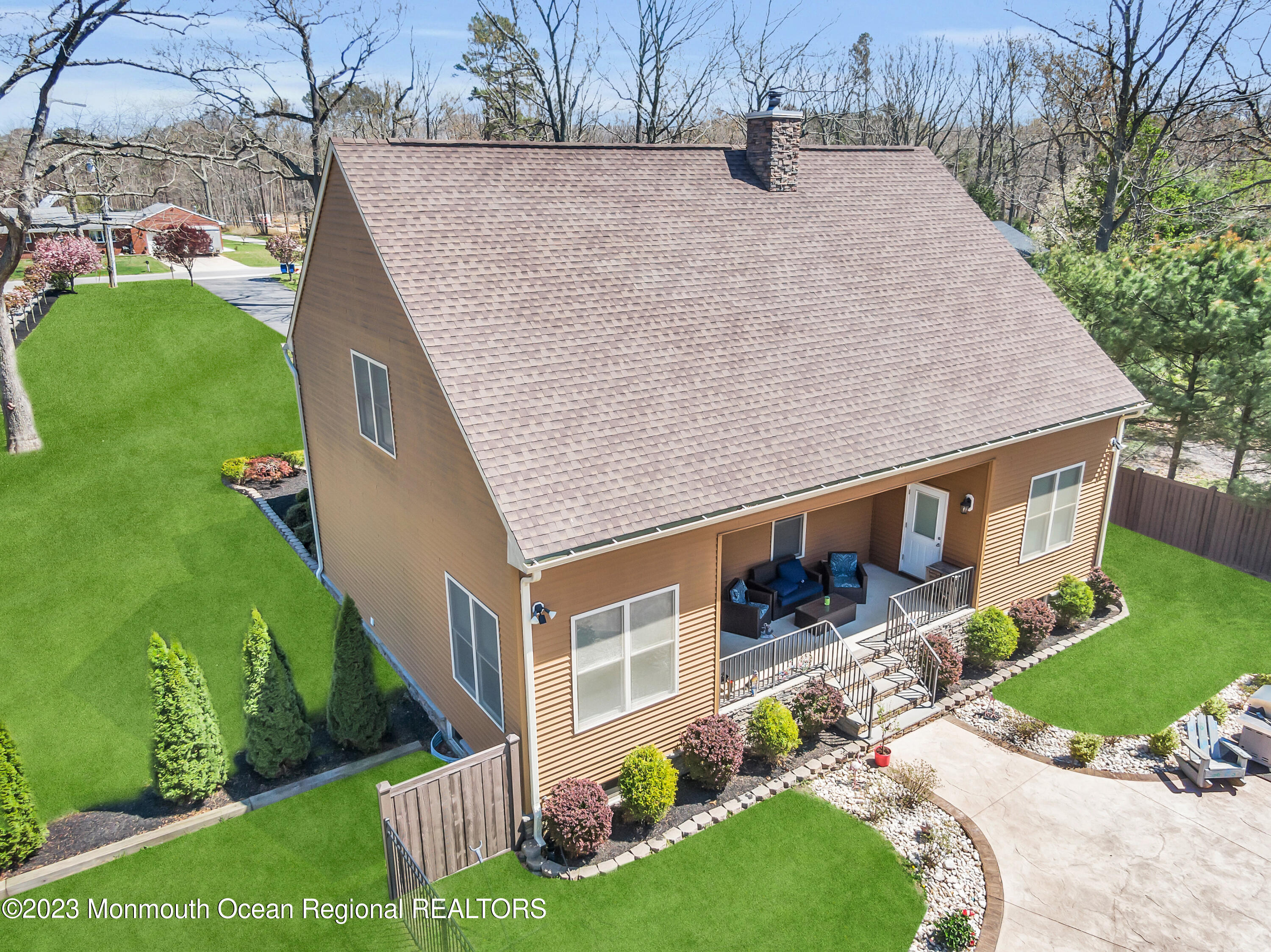 554 Whitecomb Avenue Jackson, NJ 08527 - Photo 110 of 112 a aerial view of a house with a yard and potted plants