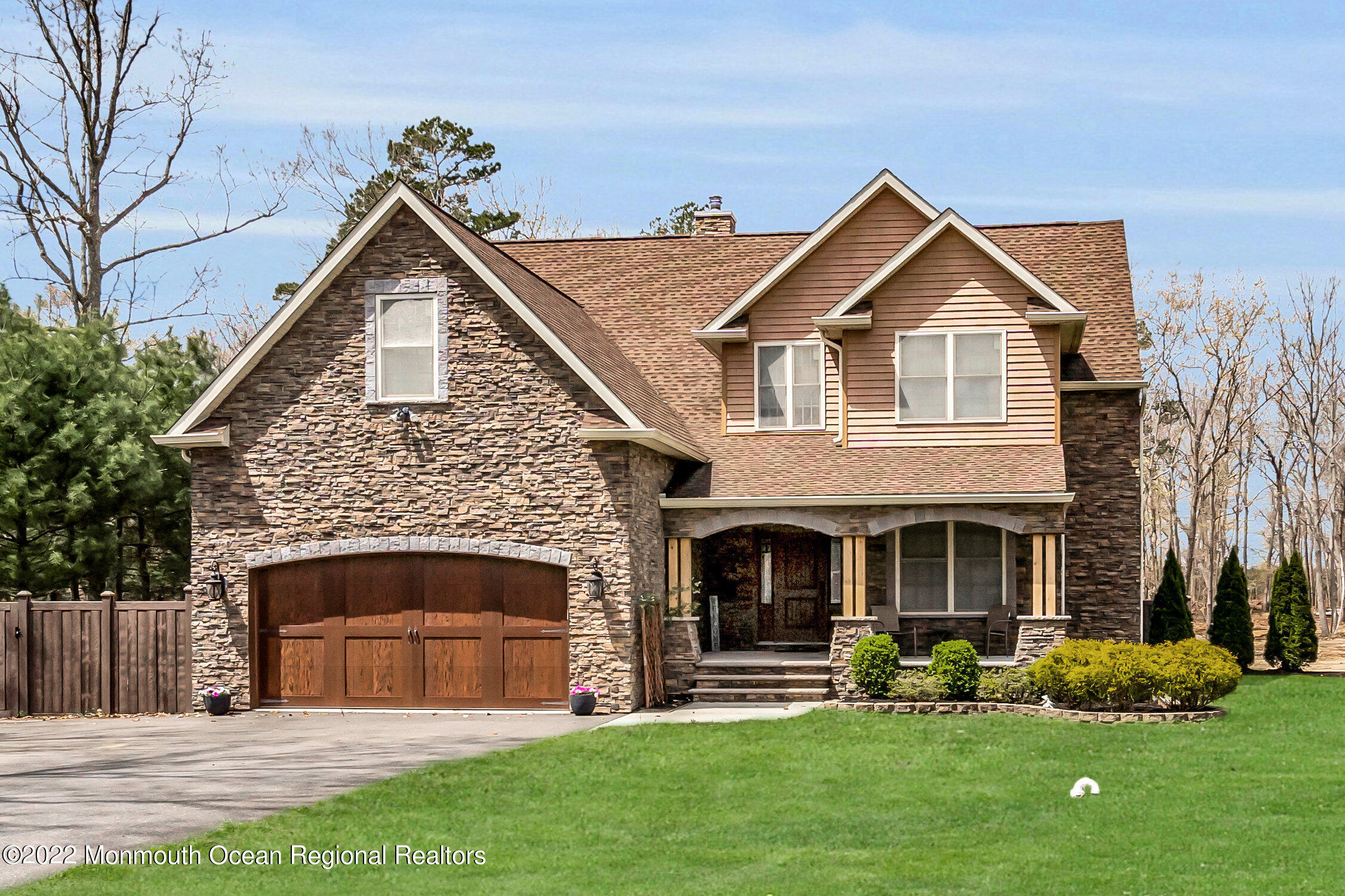 554 Whitecomb Avenue Jackson, NJ 08527 - Photo 2 of 112 a front view of a house with a yard and garage