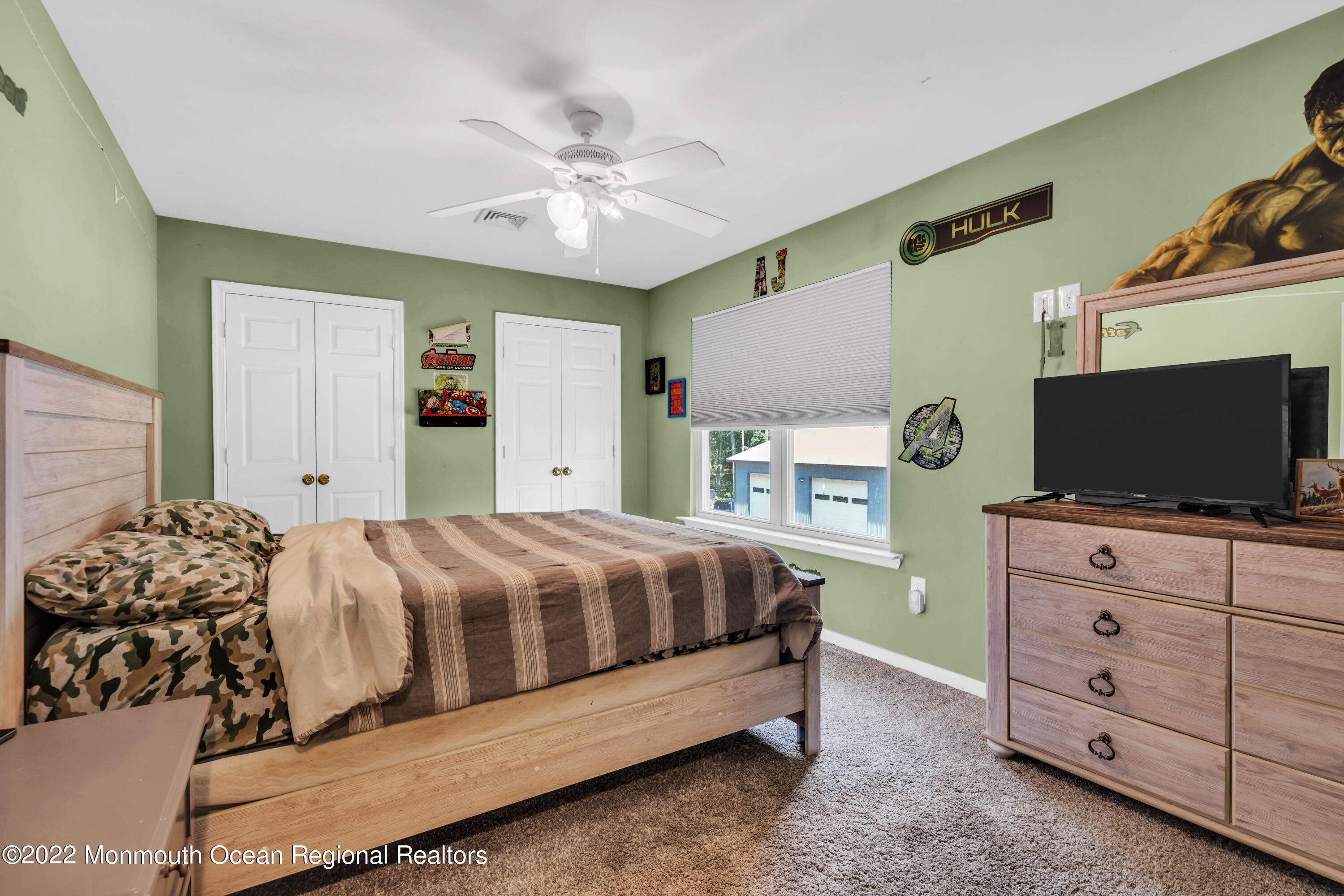 554 Whitecomb Avenue Jackson, NJ 08527 - Photo 25 of 112 a bedroom with a bed and a flat screen tv