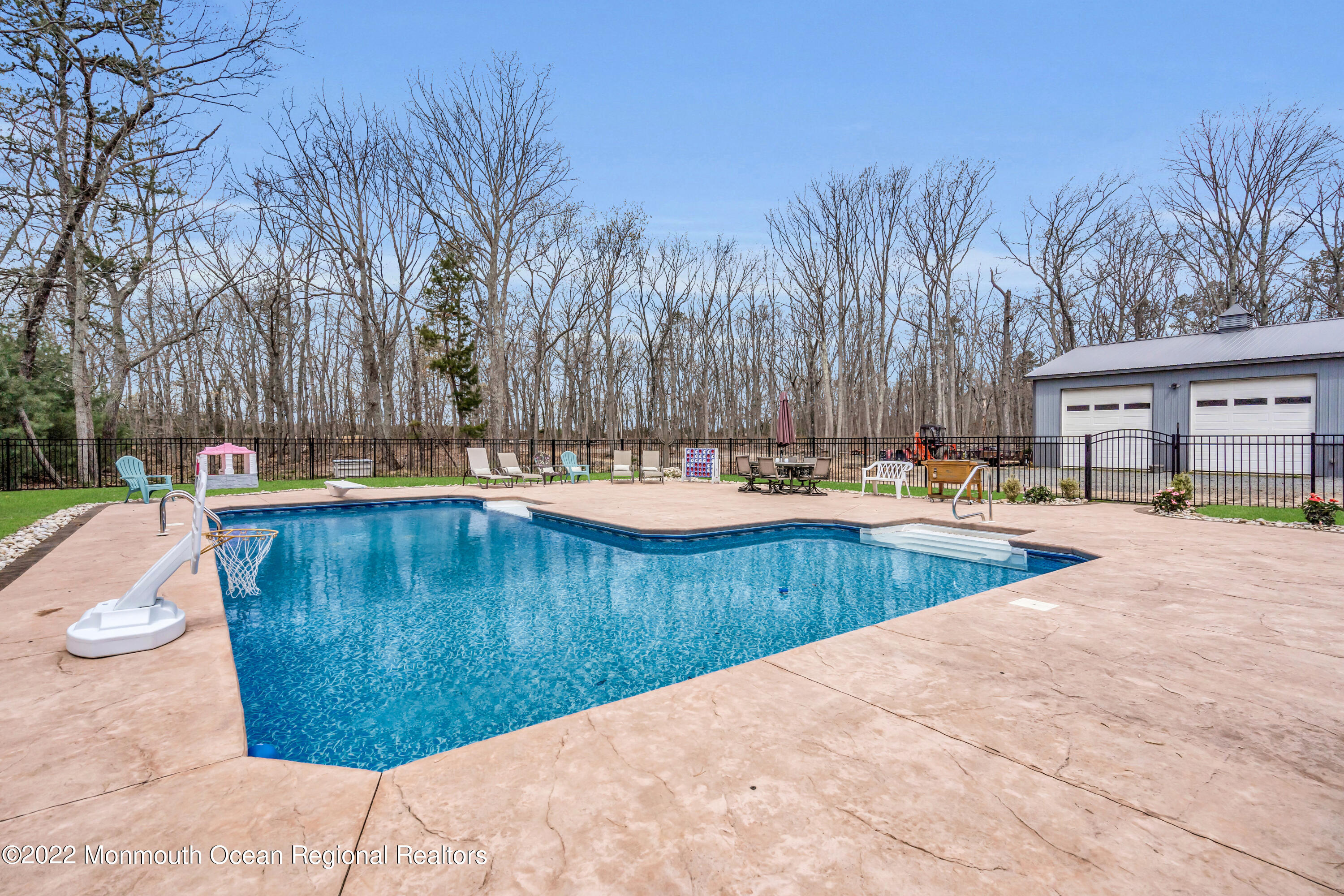 554 Whitecomb Avenue Jackson, NJ 08527 - Photo 39 of 112 a view of swimming pool with outdoor seating and plants