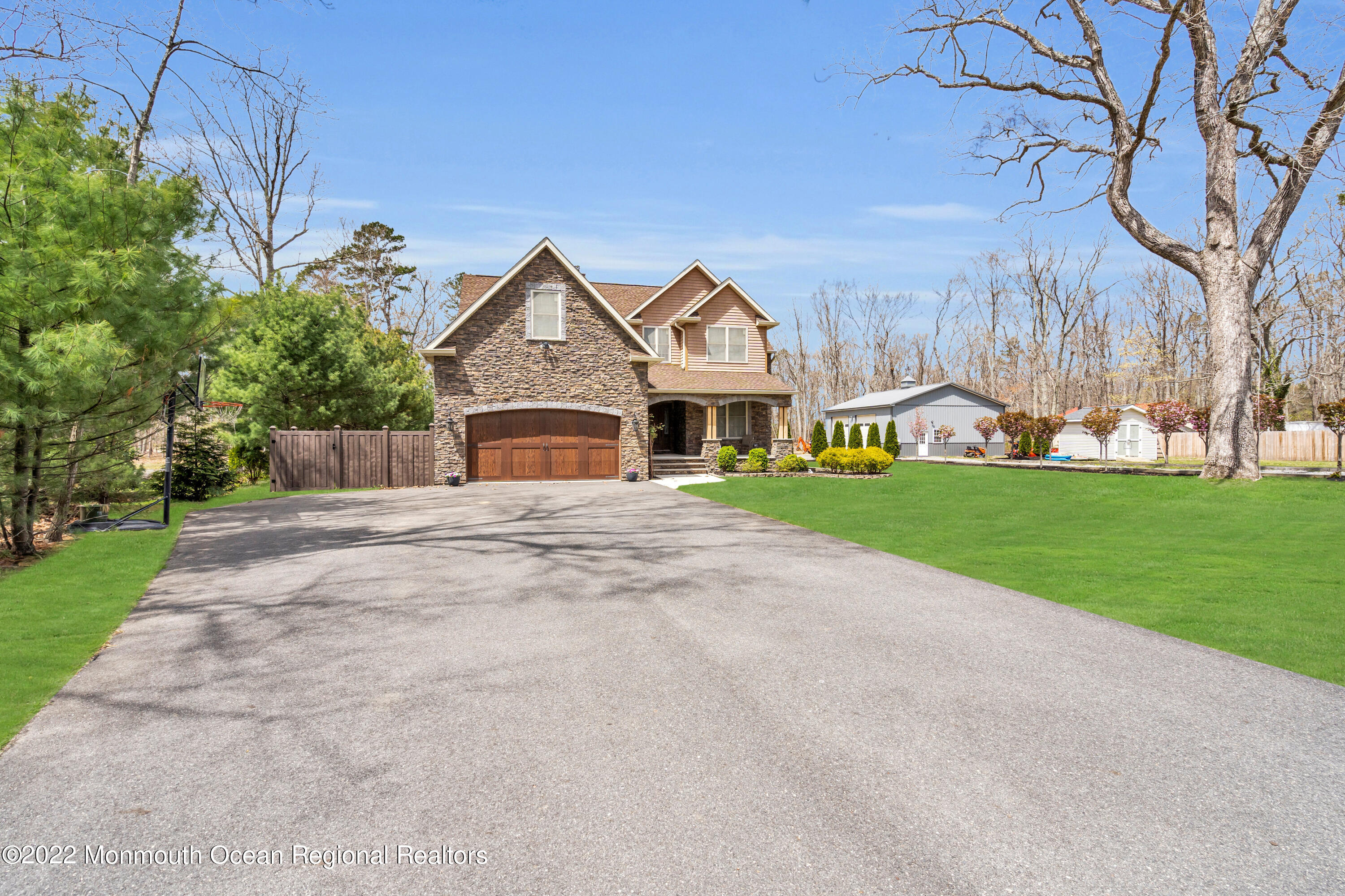 554 Whitecomb Avenue Jackson, NJ 08527 - Photo 41 of 112 a front view of a house with a yard and garage