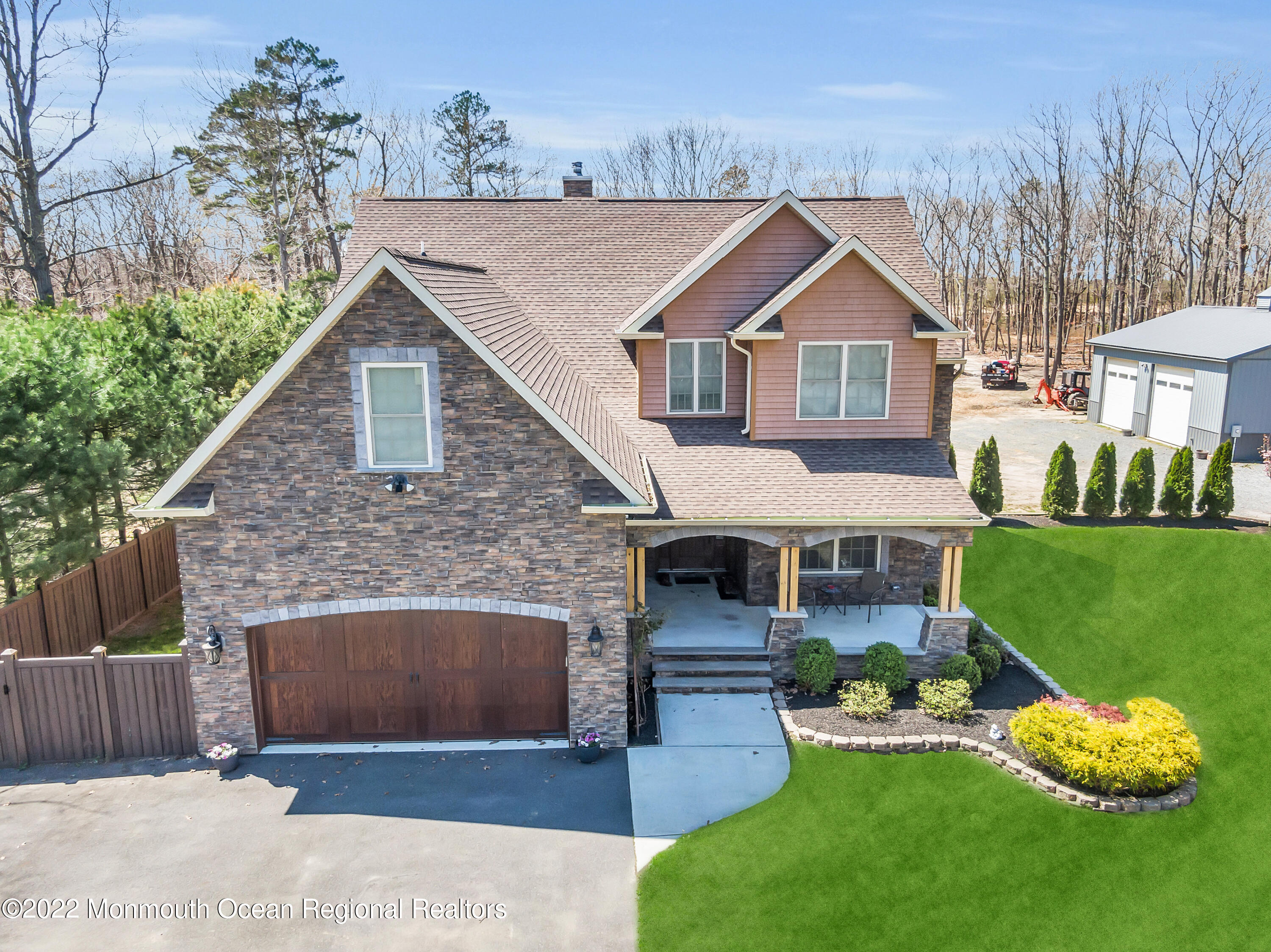 554 Whitecomb Avenue Jackson, NJ 08527 - Photo 44 of 112 a front view of a house with a yard and trees