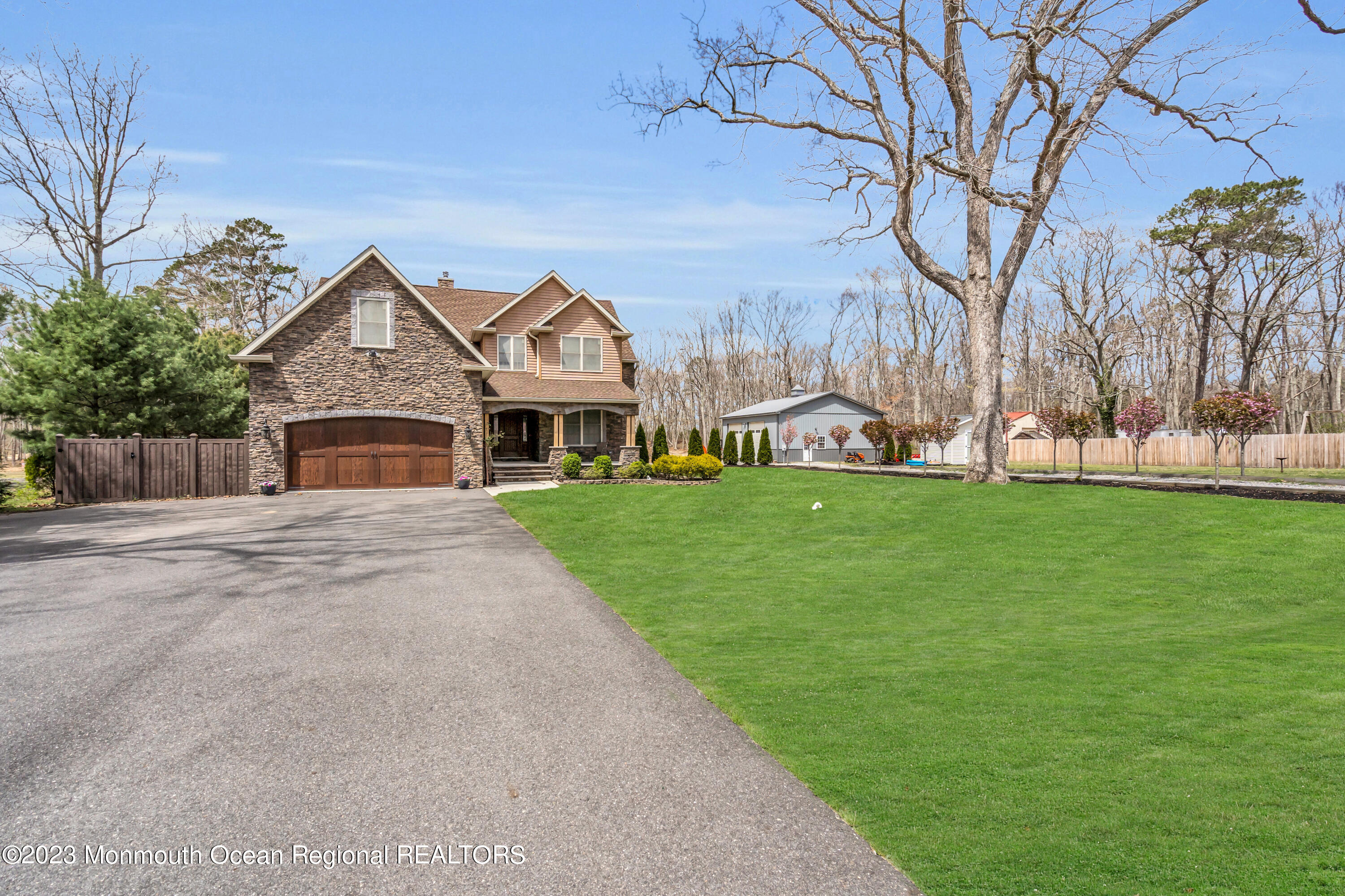 554 Whitecomb Avenue Jackson, NJ 08527 - Photo 56 of 112 a front view of a house with a yard and garage