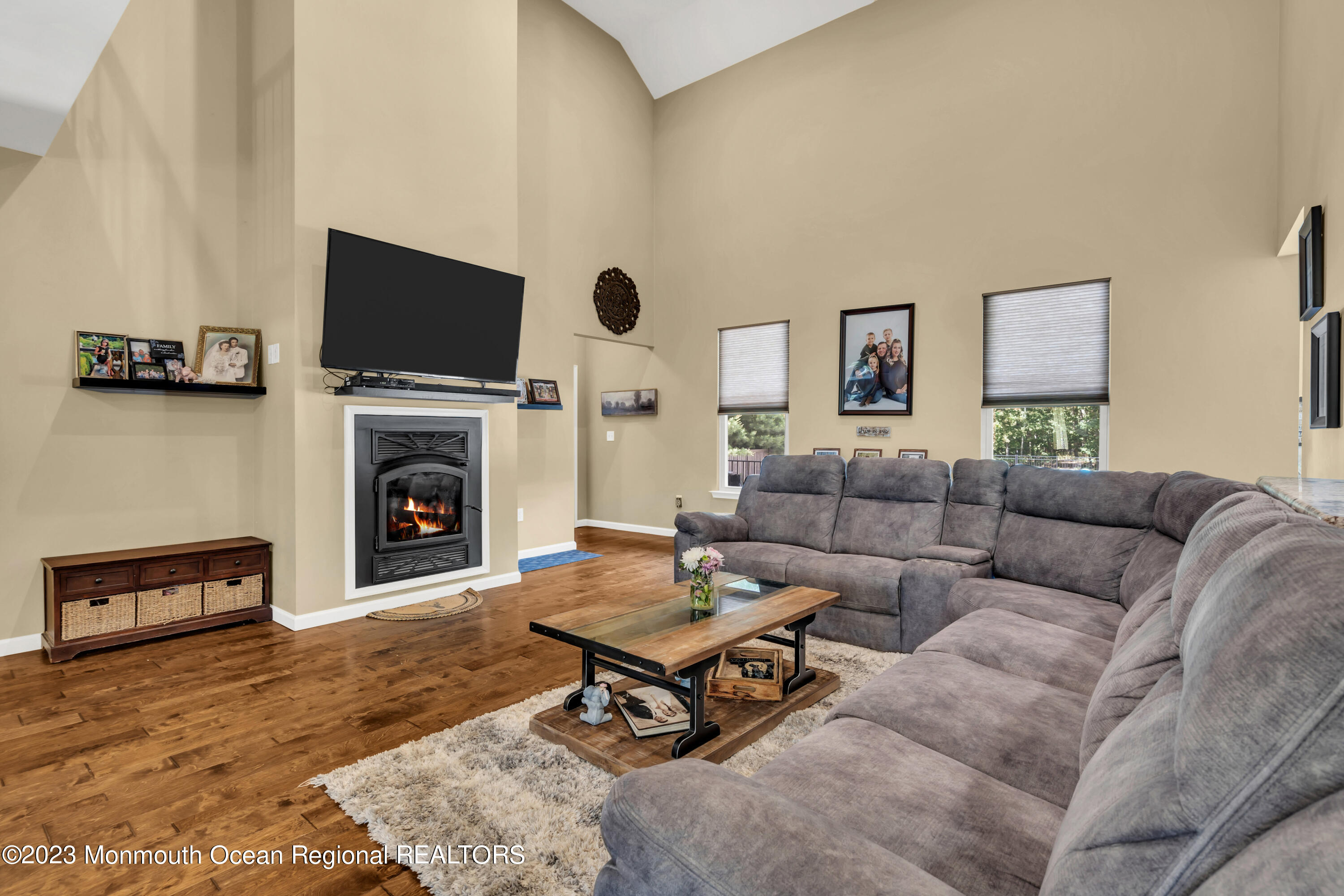 554 Whitecomb Avenue Jackson, NJ 08527 - Photo 64 of 112 a living room with furniture a rug and a fireplace
