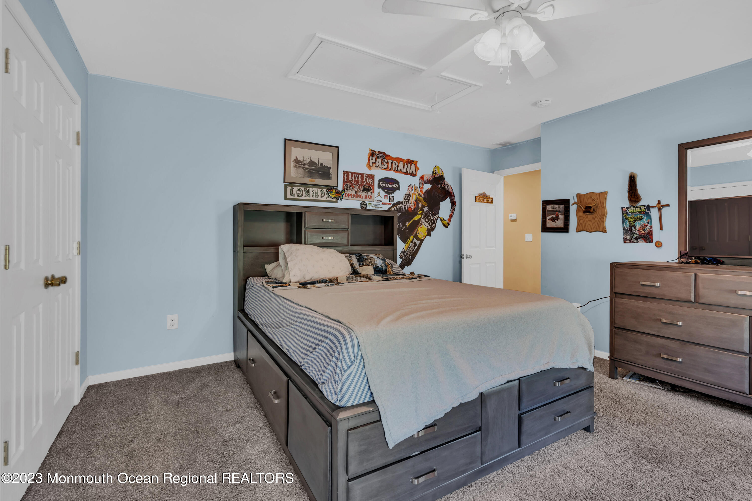 554 Whitecomb Avenue Jackson, NJ 08527 - Photo 76 of 112 a bedroom with a bed and a flat tv screen on dresser