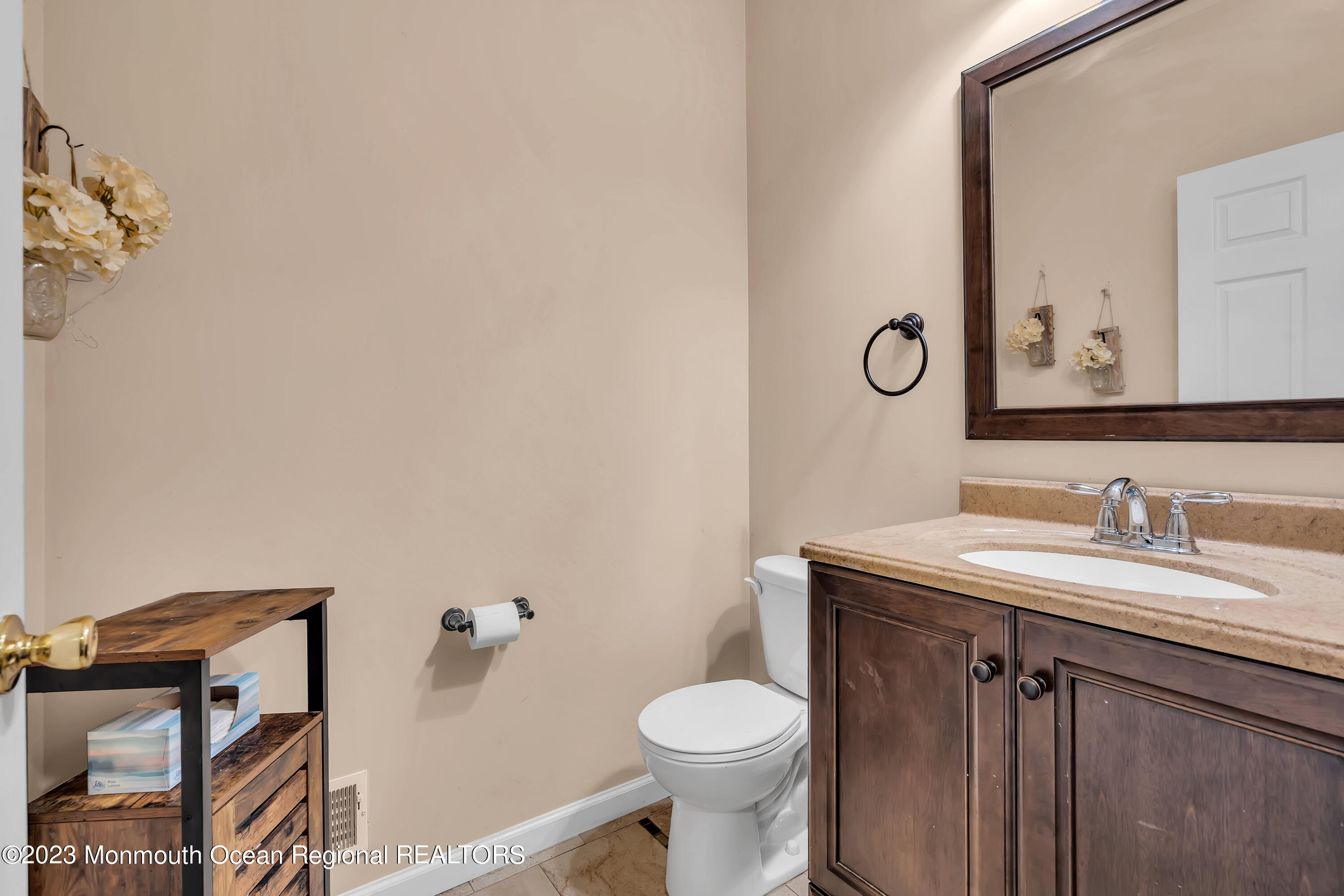554 Whitecomb Avenue Jackson, NJ 08527 - Photo 89 of 112 a bathroom with a granite countertop toilet sink and mirror