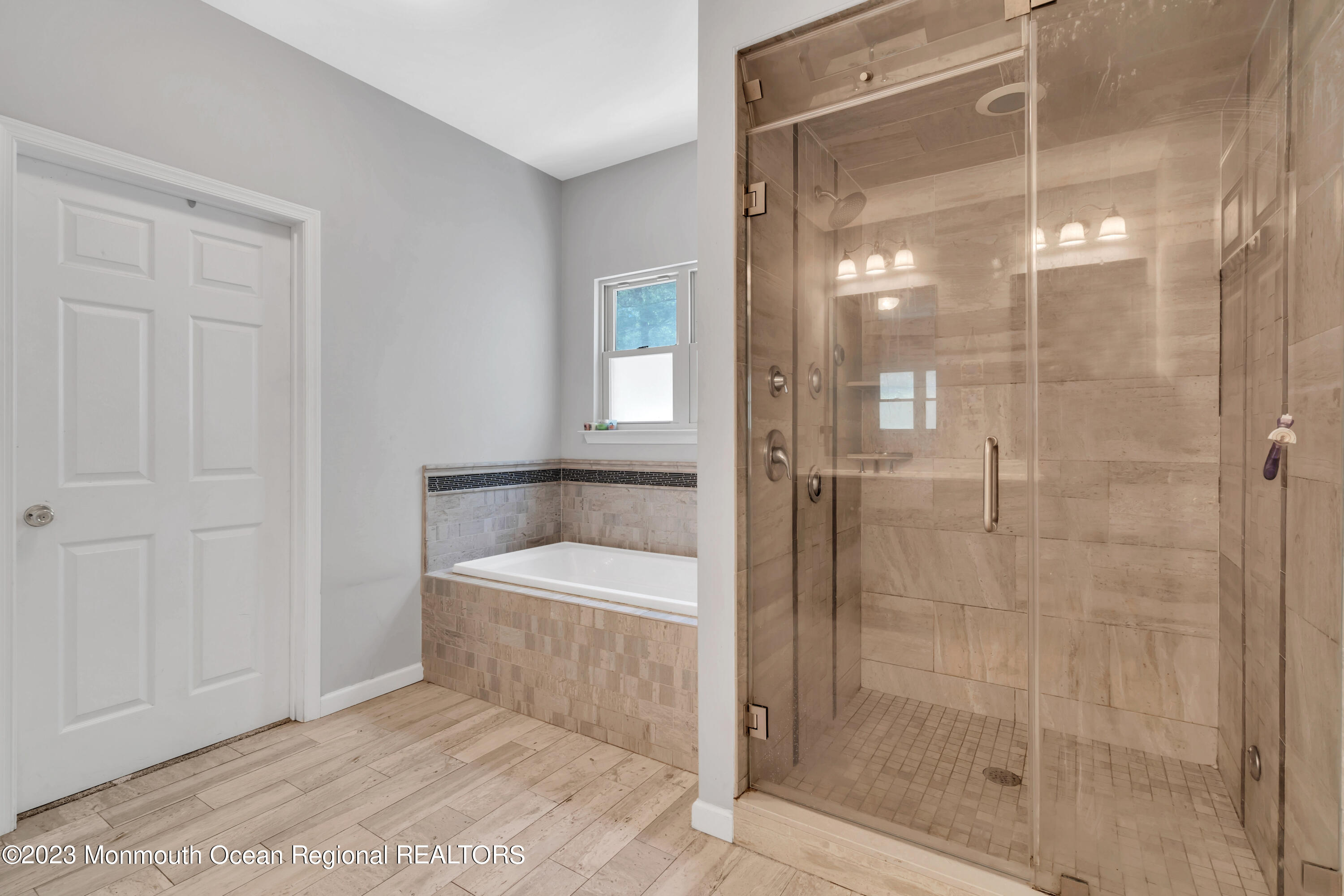 554 Whitecomb Avenue Jackson, NJ 08527 - Photo 91 of 112 a bathroom with a bathtub and a shower