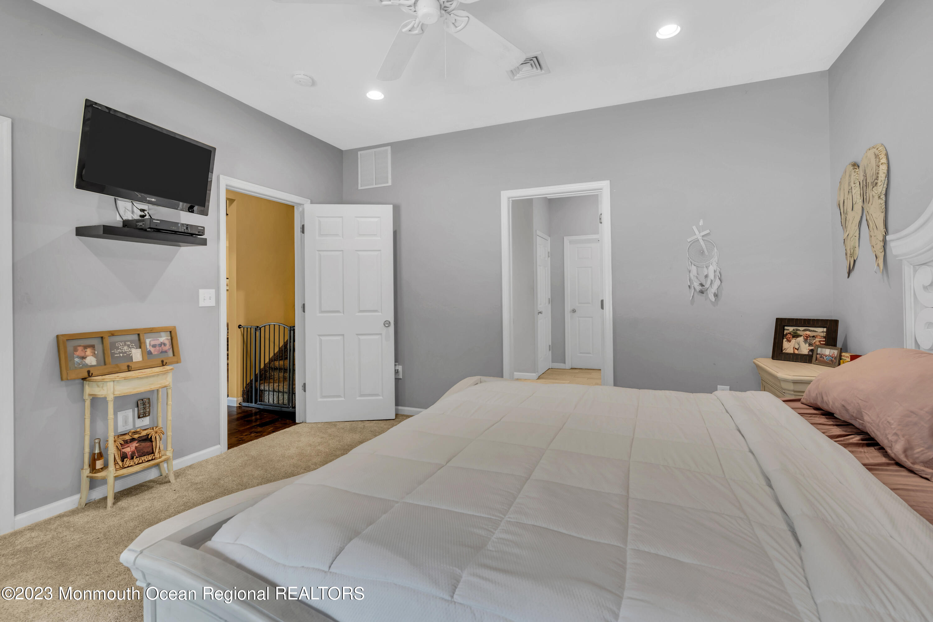 554 Whitecomb Avenue Jackson, NJ 08527 - Photo 98 of 112 a bedroom with a bed and a flat screen tv
