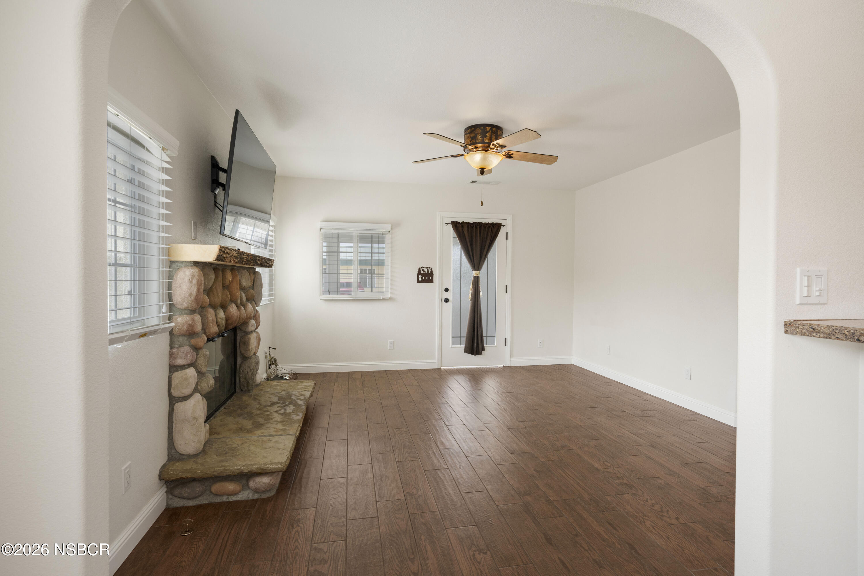 138 North E Street Lompoc, CA 93436 - Photo 7 of 35 a view of a livingroom with furniture and a window