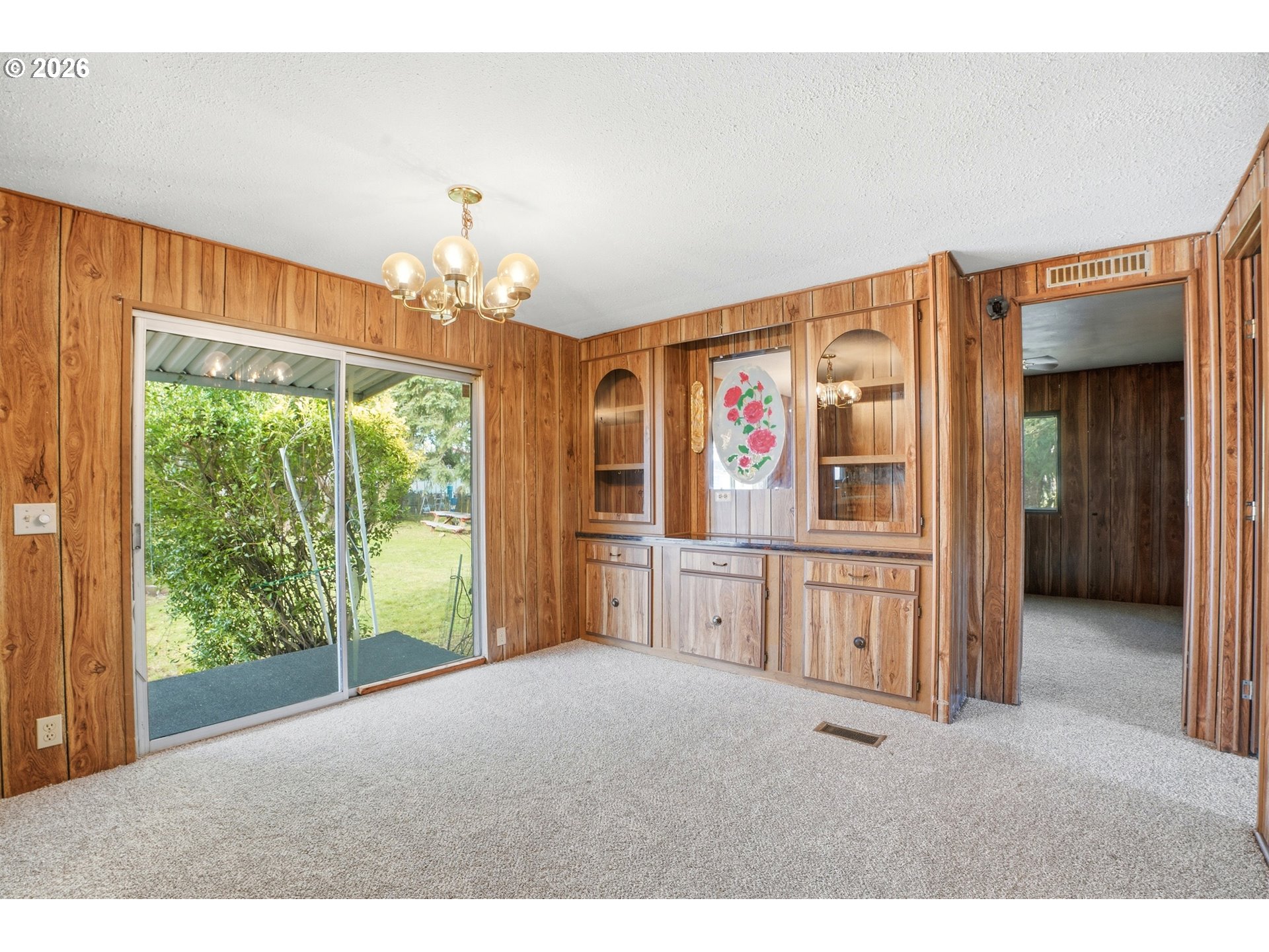 34931 Jackson Way, Unit 36 Scappoose, OR 97056 - Photo 11 of 35 a view of a kitchen with granite countertop a large window and a sink