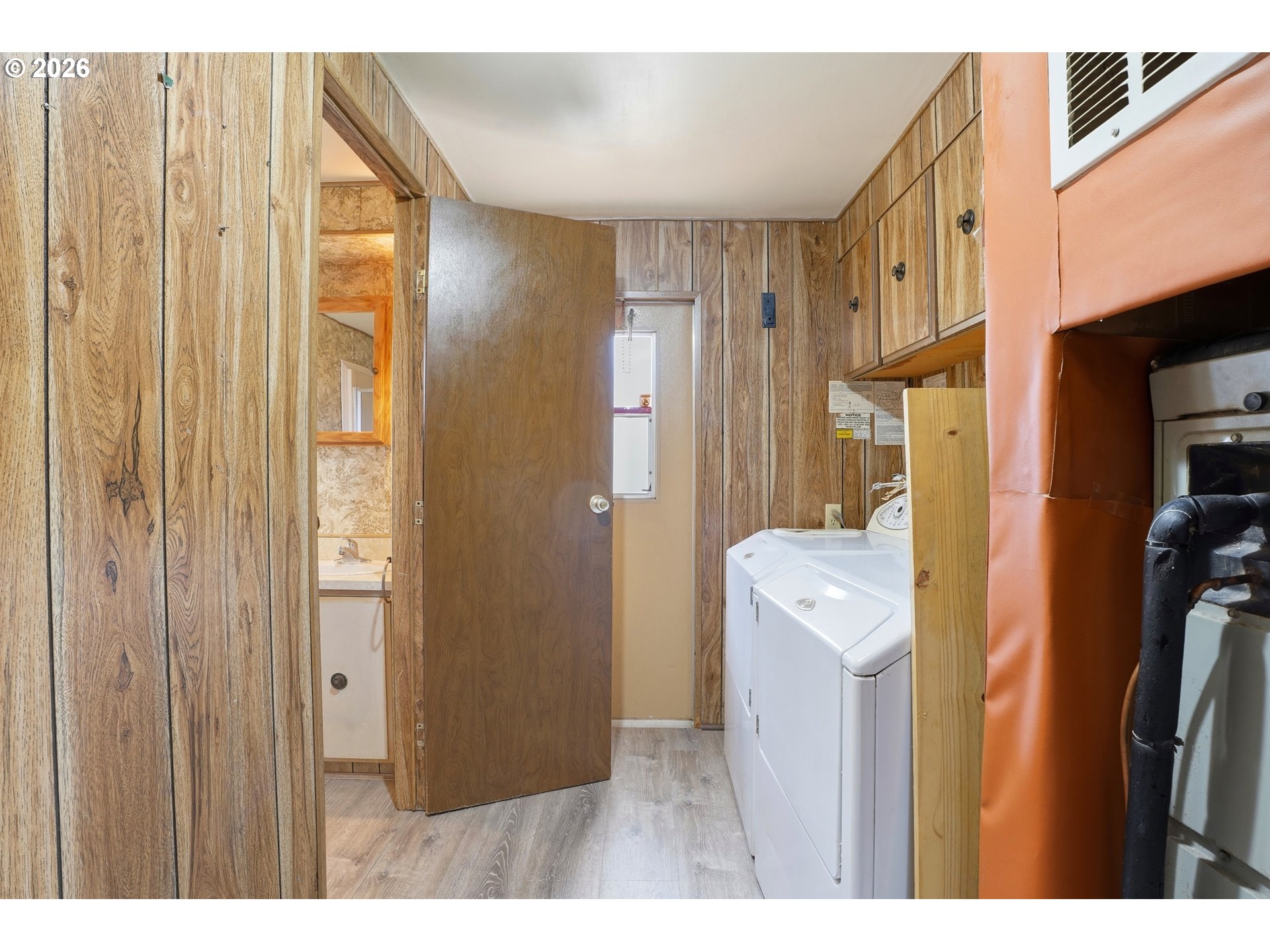 34931 Jackson Way, Unit 36 Scappoose, OR 97056 - Photo 15 of 35 a bathroom with a sink a mirror and a shower