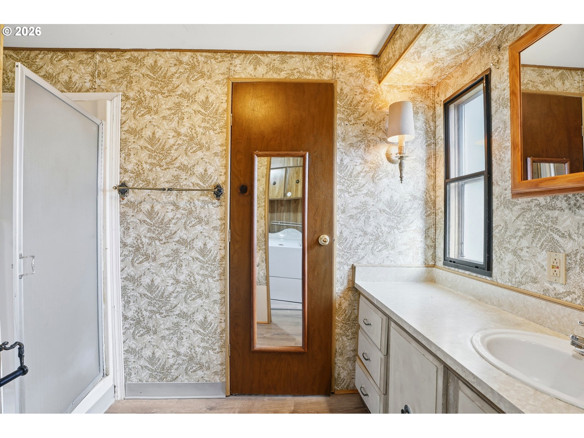 34931 Jackson Way, Unit 36 Scappoose, OR 97056 - Photo 16 of 35 a bathroom with a sink and a mirror