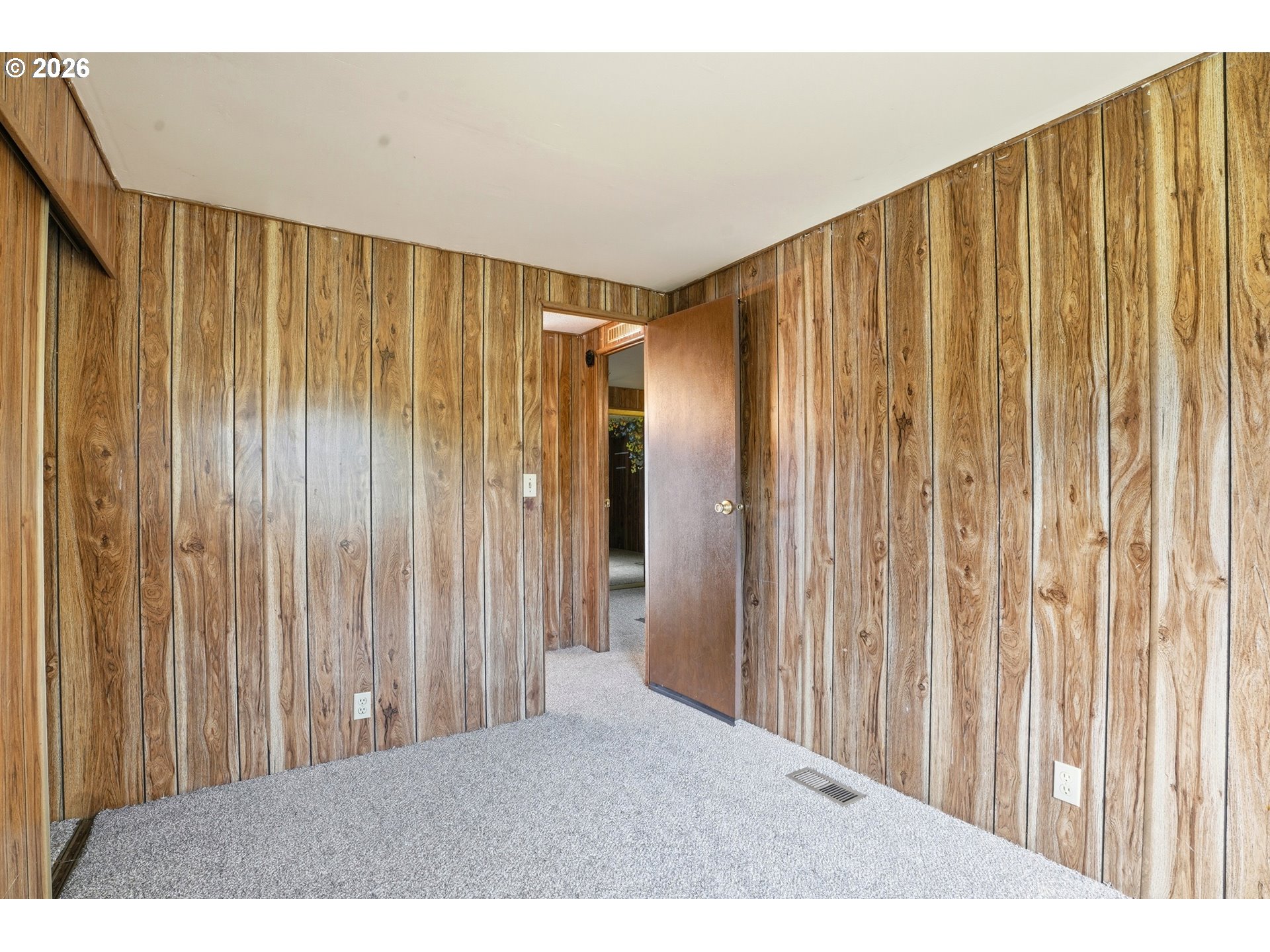 34931 Jackson Way, Unit 36 Scappoose, OR 97056 - Photo 18 of 35 a view of a room with a wooden walls