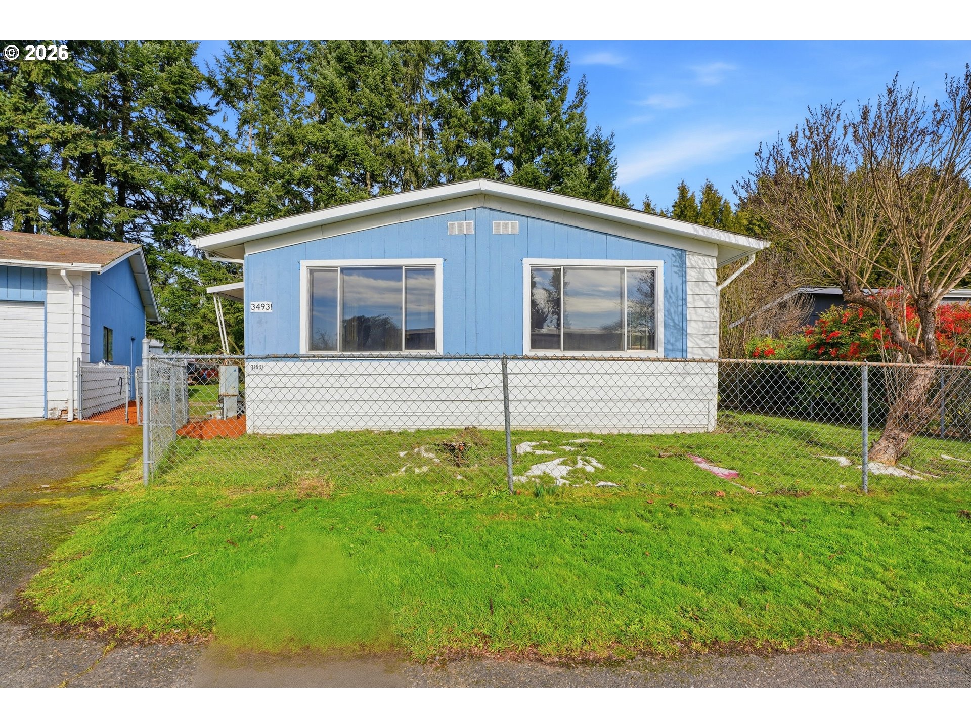 34931 Jackson Way, Unit 36 Scappoose, OR 97056 - Photo 2 of 35 a view of a house with a backyard