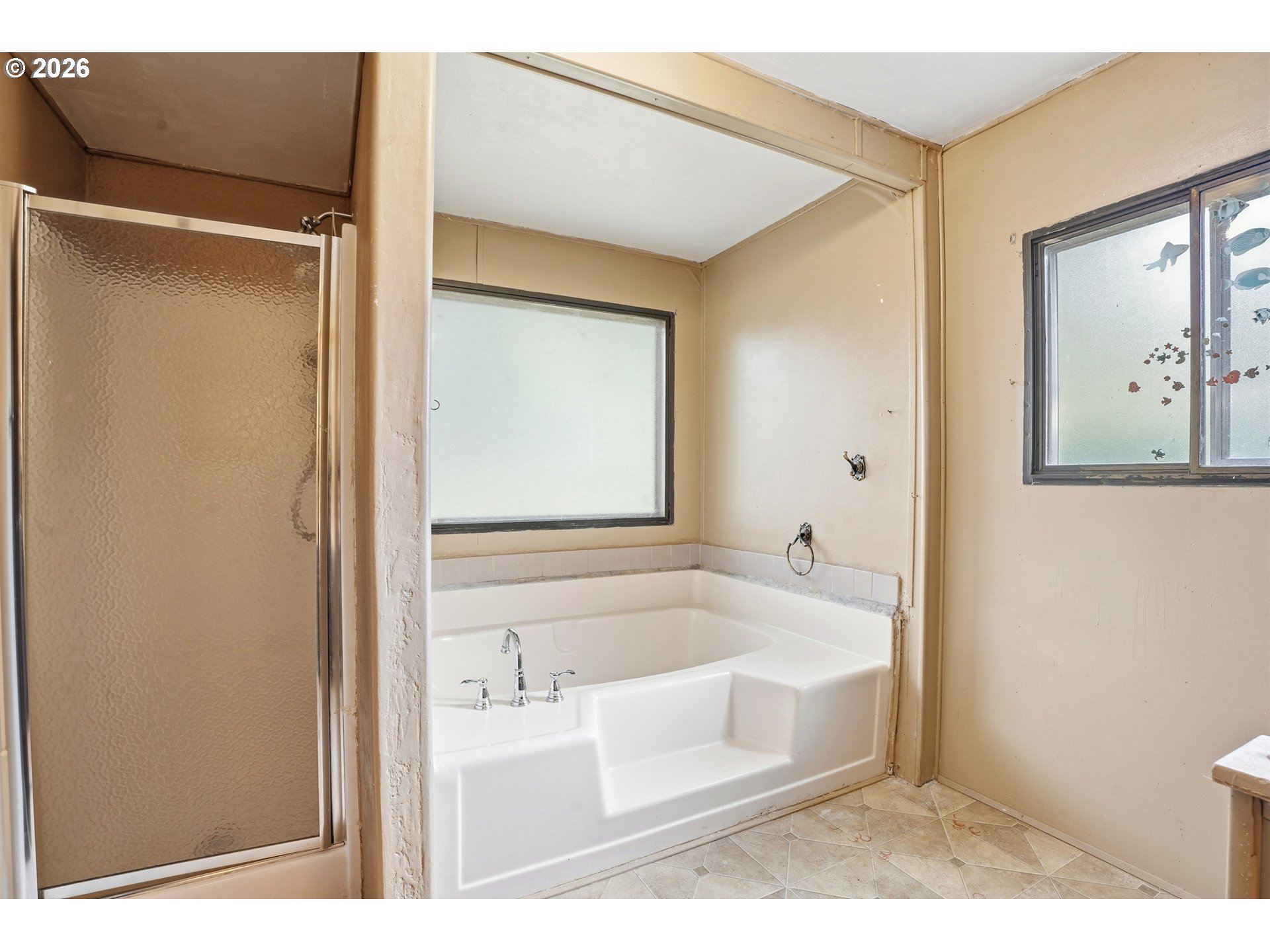 34931 Jackson Way, Unit 36 Scappoose, OR 97056 - Photo 24 of 35 a bathroom with a bathtub and a sink