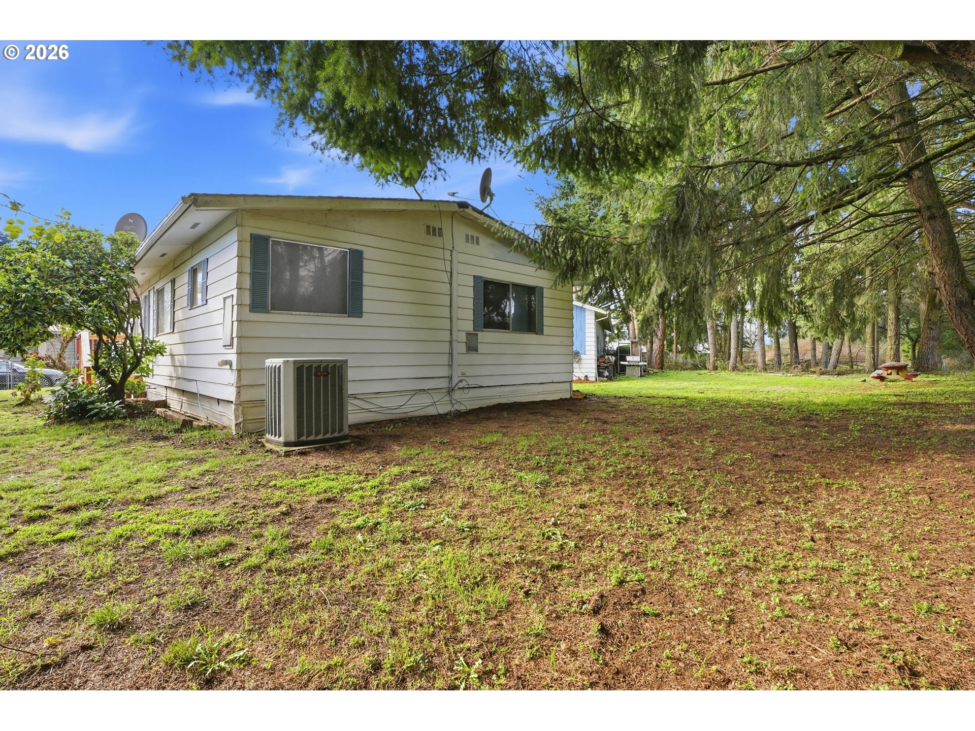 34931 Jackson Way, Unit 36 Scappoose, OR 97056 - Photo 28 of 35 a front view of house with yard