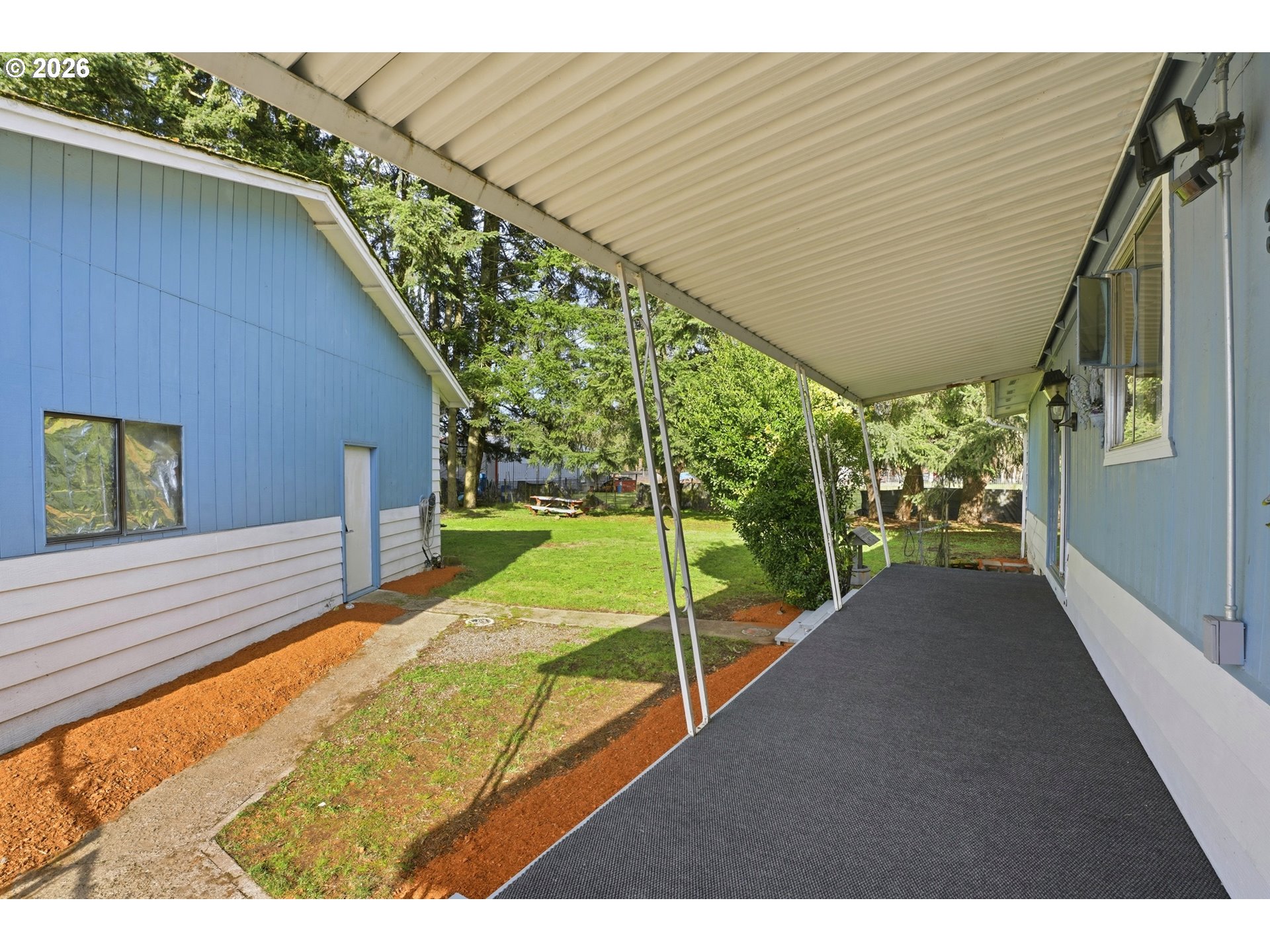 34931 Jackson Way, Unit 36 Scappoose, OR 97056 - Photo 3 of 35 a view of a backyard