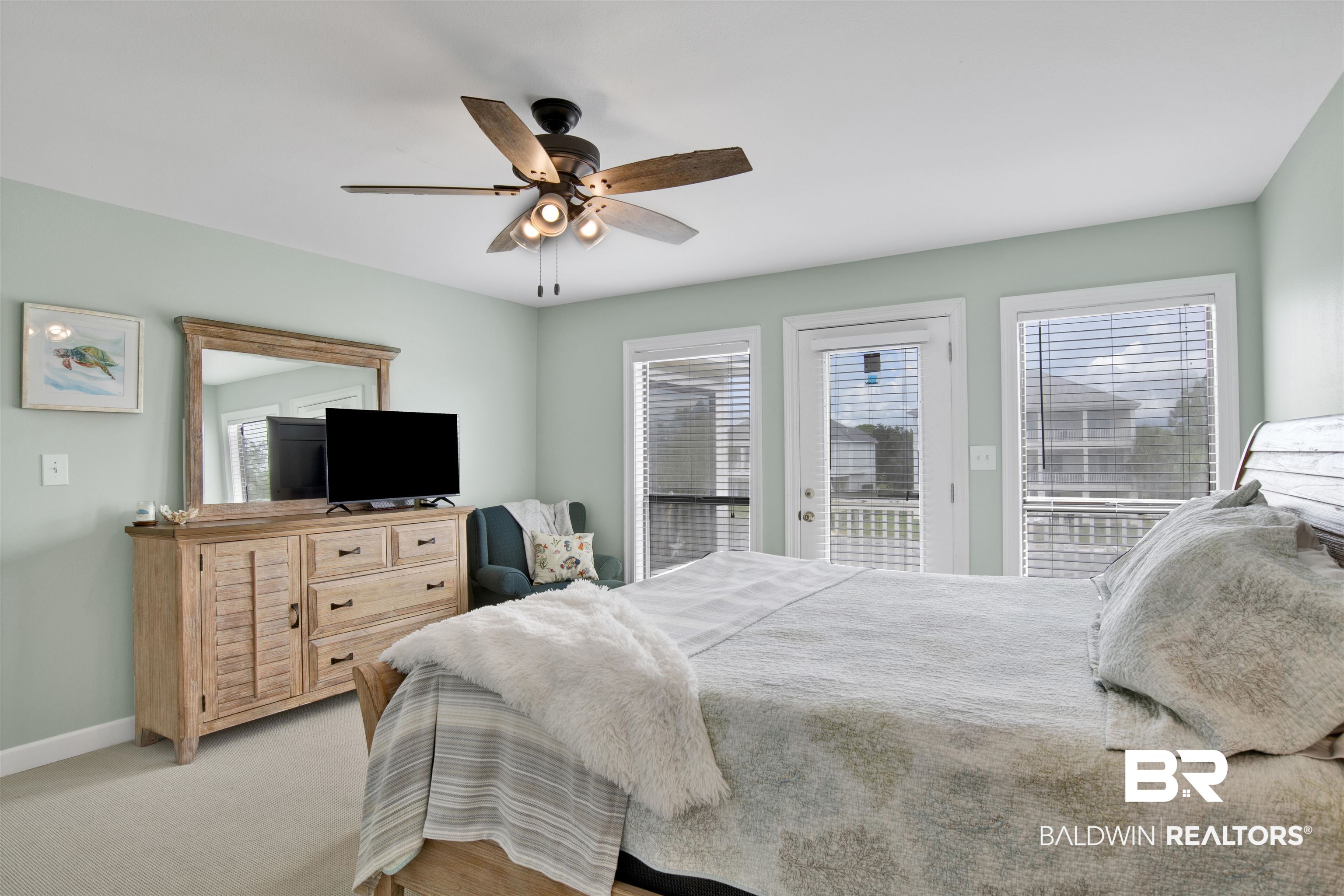 33093 River Road Orange Beach, AL 36561 - Photo 13 of 30 Bedroom with access to exterior, ceiling fan, and light colored carpet