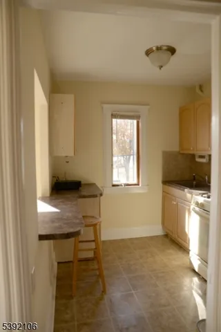 a workspace with furniture and window