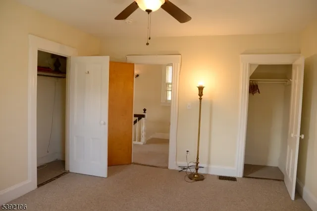 a view of a room with a hallway