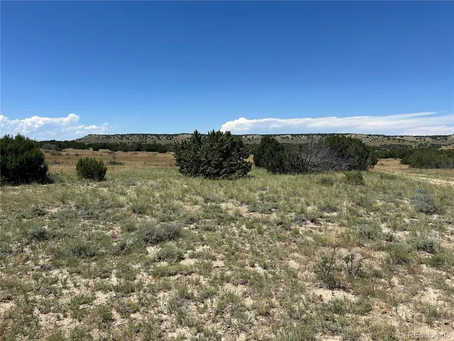 a view of a lake with a mountain in the background