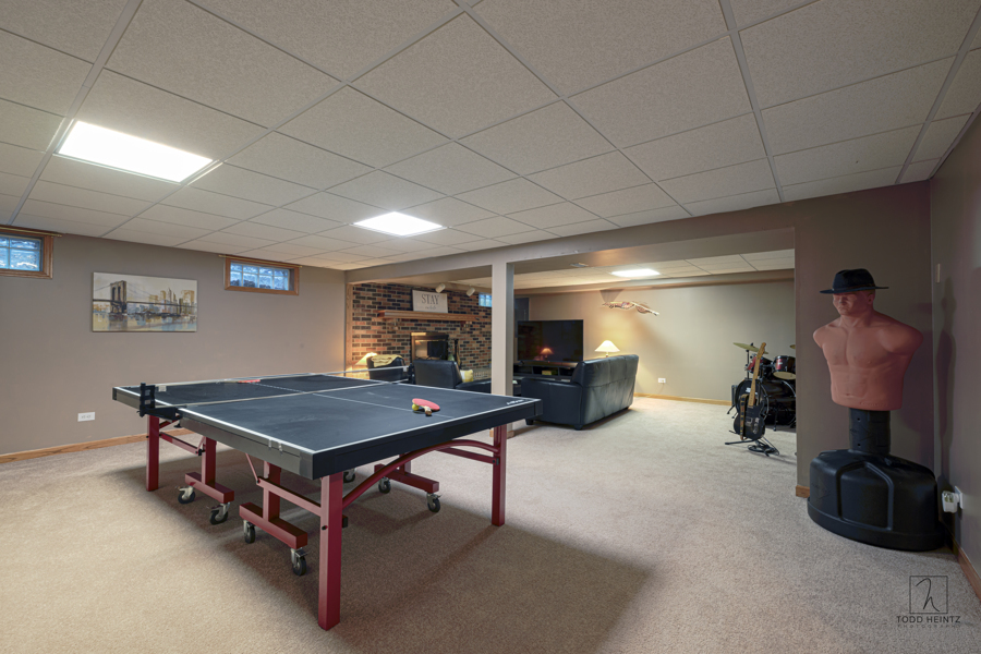 11506 Cemetery Road Capron, IL 61012 - Photo 20 of 42 a room with furniture and air hockey table