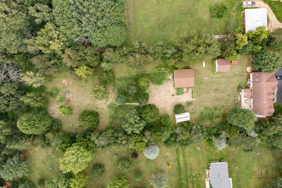 11506 Cemetery Road Capron, IL 61012 - Photo 37 of 42 an aerial view of residential house with outdoor space and trees around