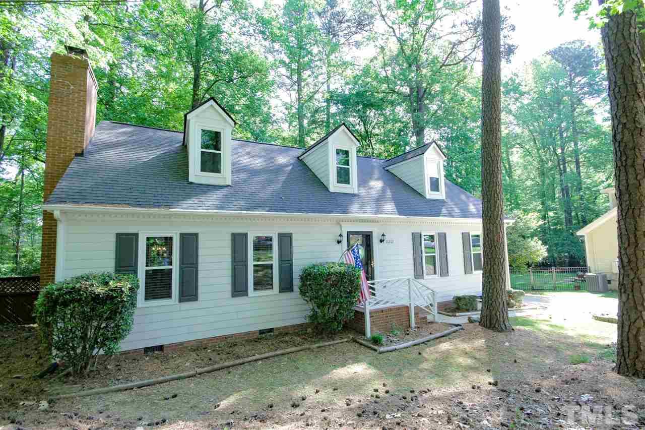 8212 Hambledon Court Raleigh, NC 27615 - Photo 1 of 28 a front view of a house with garden
