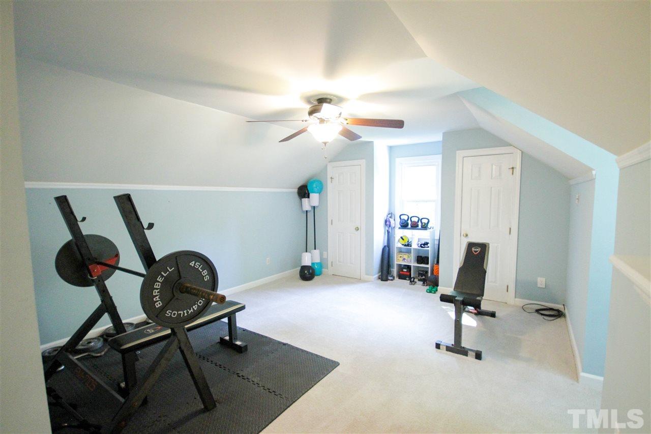 8212 Hambledon Court Raleigh, NC 27615 - Photo 13 of 28 a view of a workspace with furniture and a window