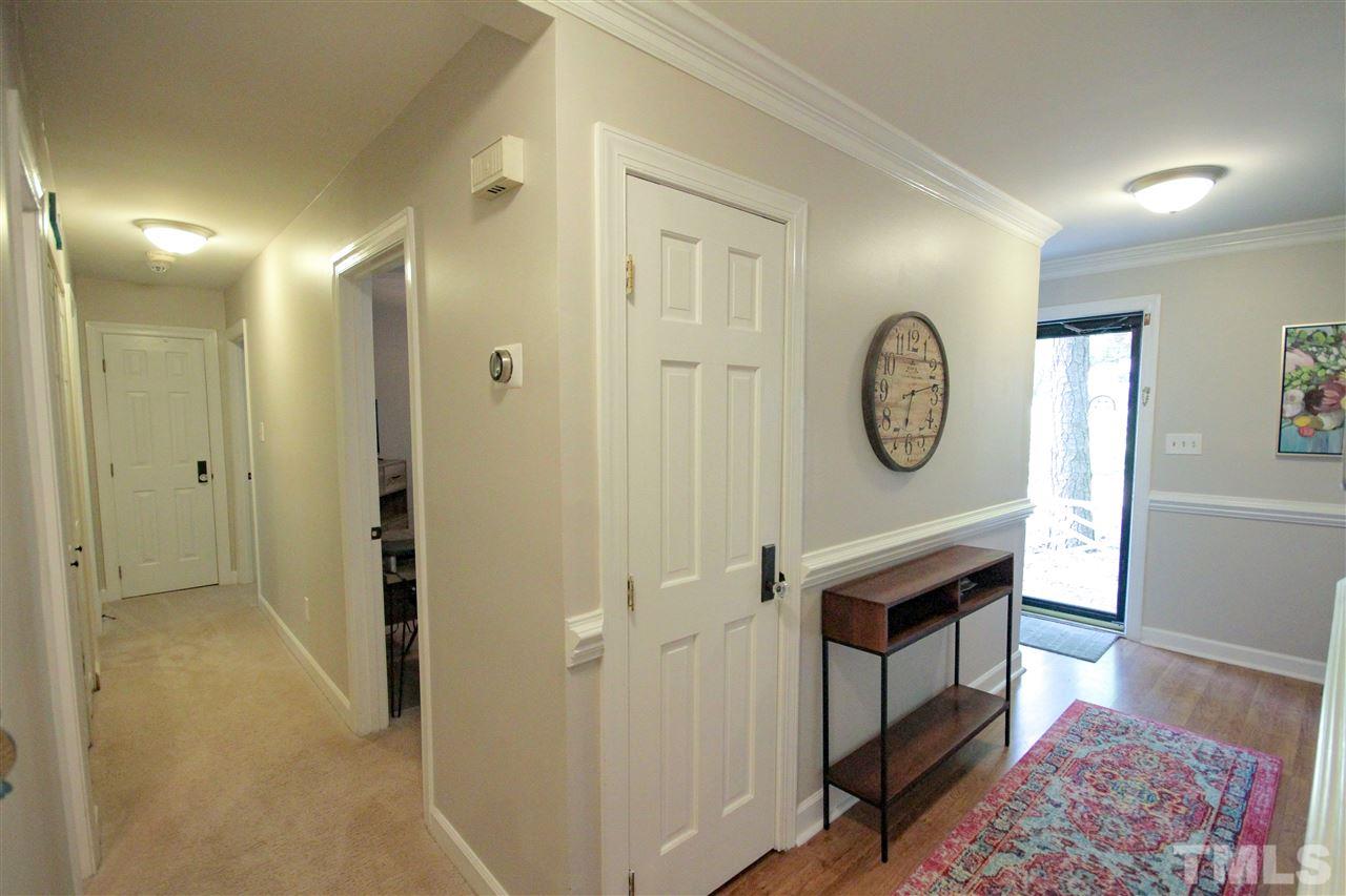 8212 Hambledon Court Raleigh, NC 27615 - Photo 20 of 28 a view of a hallway with entryway