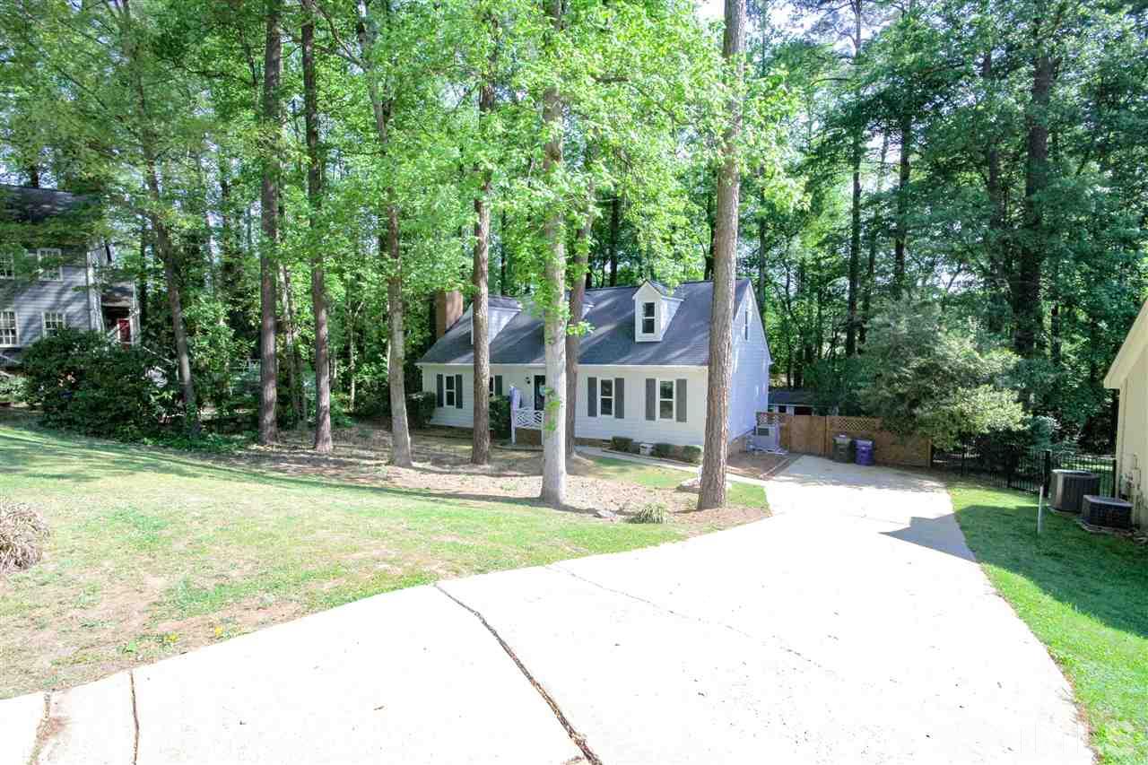 8212 Hambledon Court Raleigh, NC 27615 - Photo 23 of 28 a house with yard in front of it