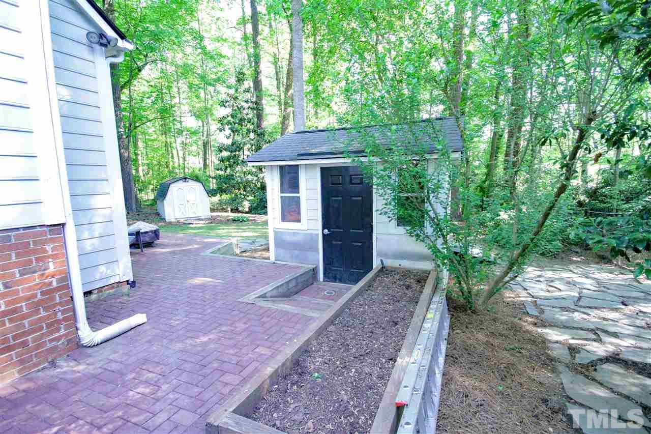 8212 Hambledon Court Raleigh, NC 27615 - Photo 25 of 28 a view of a back yard