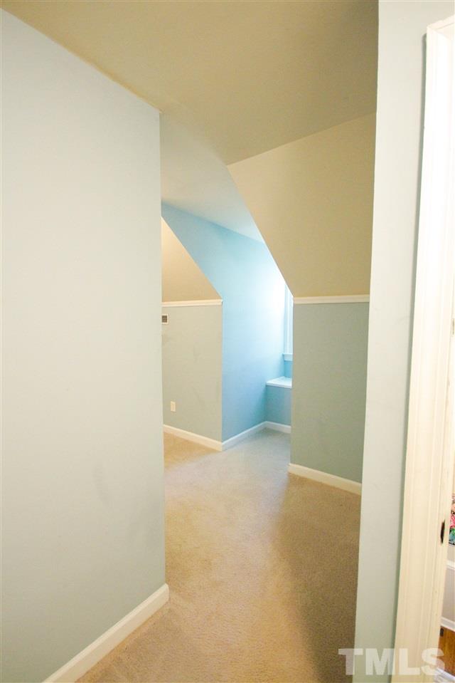 8212 Hambledon Court Raleigh, NC 27615 - Photo 28 of 28 a view of a big room with closet and mirror