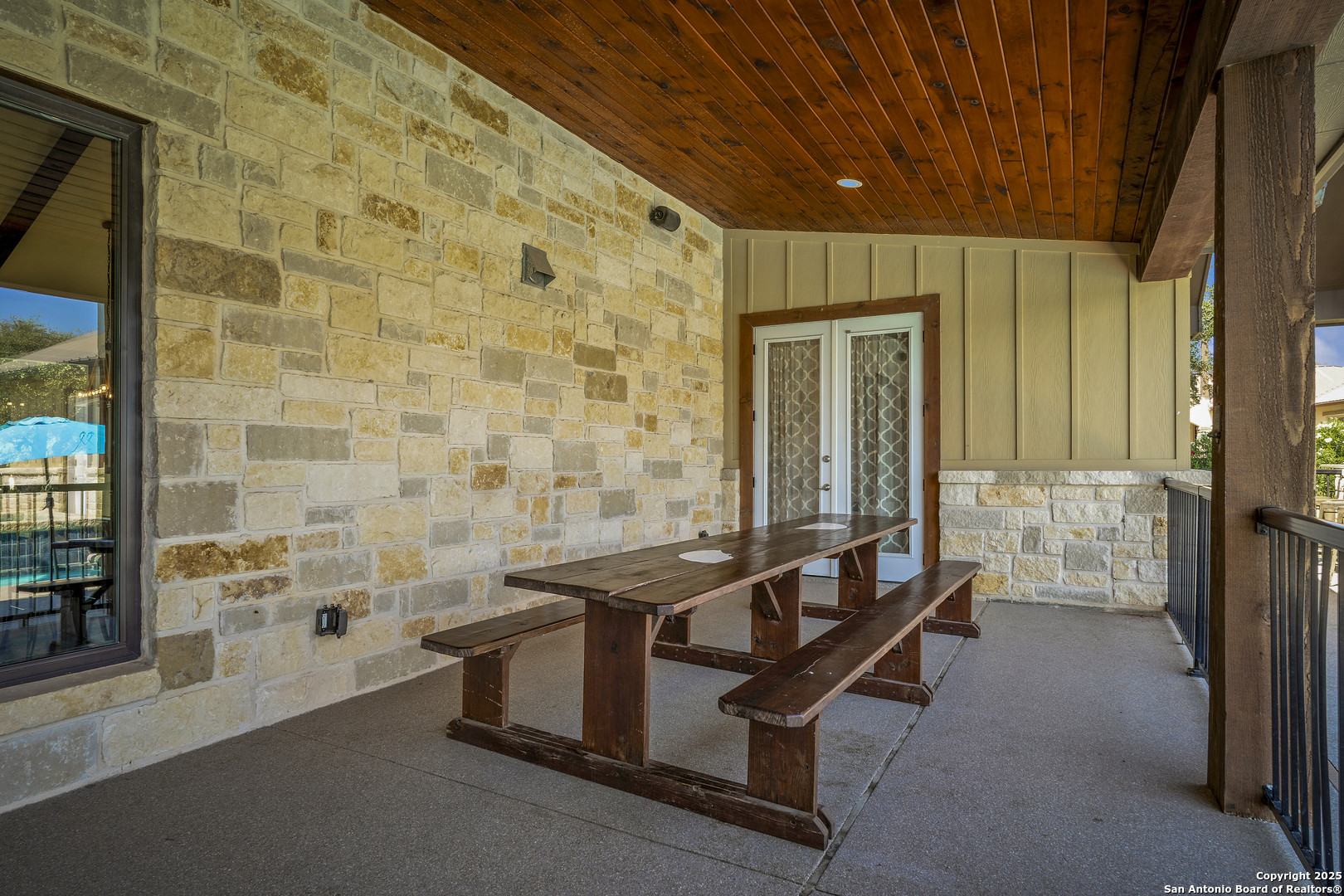 1185 Mountain Vly Drive Concan, TX 78838 - Photo 19 of 27 a bath room with a table chairs and entryway