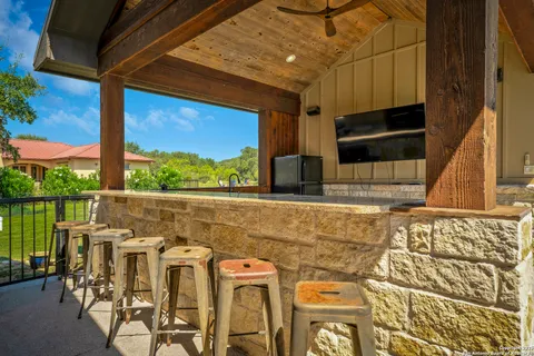 a view of balcony with furniture