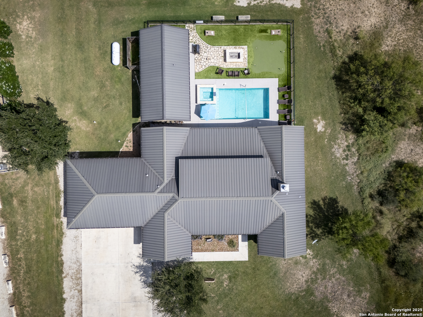 1185 Mountain Vly Drive Concan, TX 78838 - Photo 6 of 27 an aerial view of a house