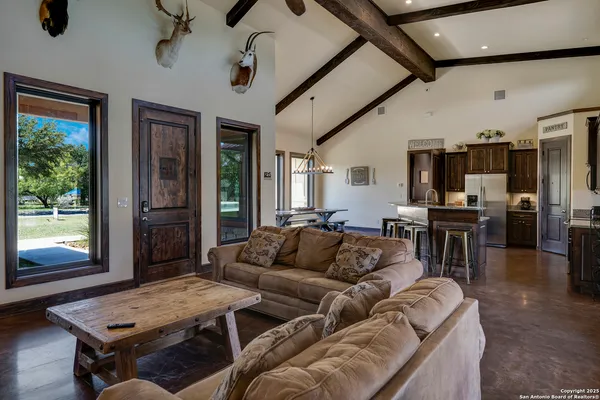 a living room with furniture and a window