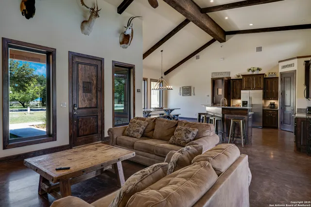 a living room with furniture and a window