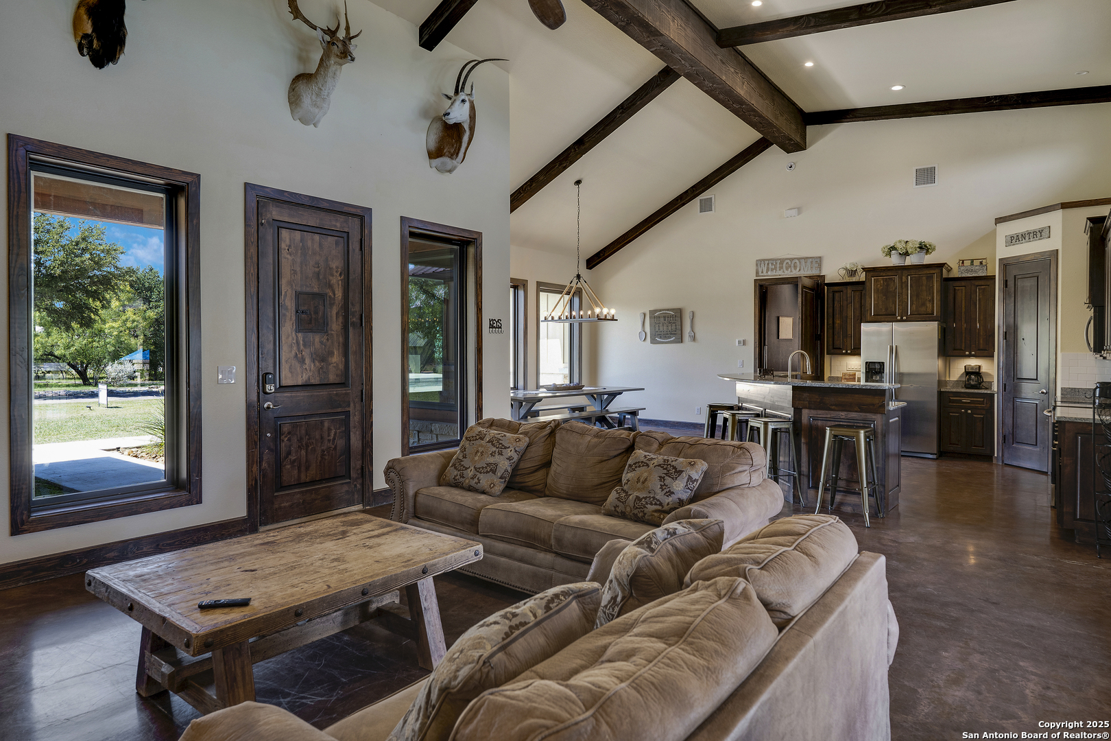 1185 Mountain Vly Drive Concan, TX 78838 - Photo 8 of 27 a living room with furniture and a window