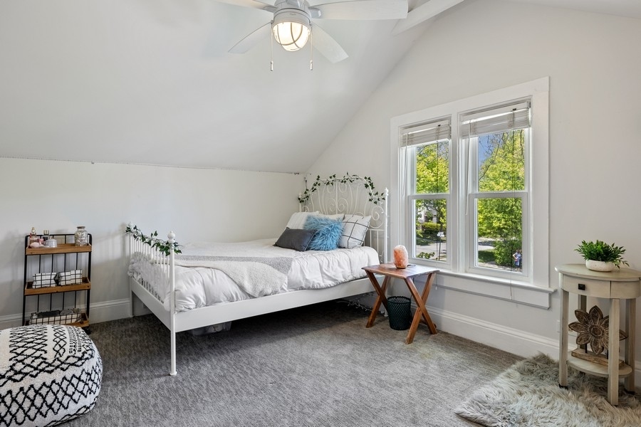 618 Willow Road Winnetka, IL 60093 - Photo 21 of 27 a bedroom with a bed and a window