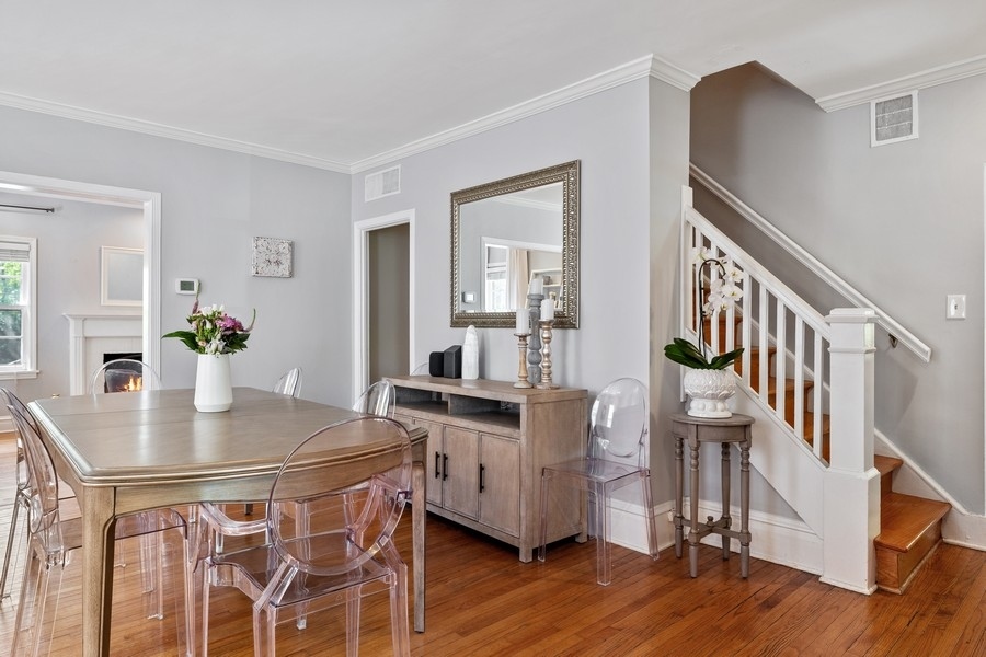 618 Willow Road Winnetka, IL 60093 - Photo 6 of 27 a view of a dining room with furniture and wooden floor
