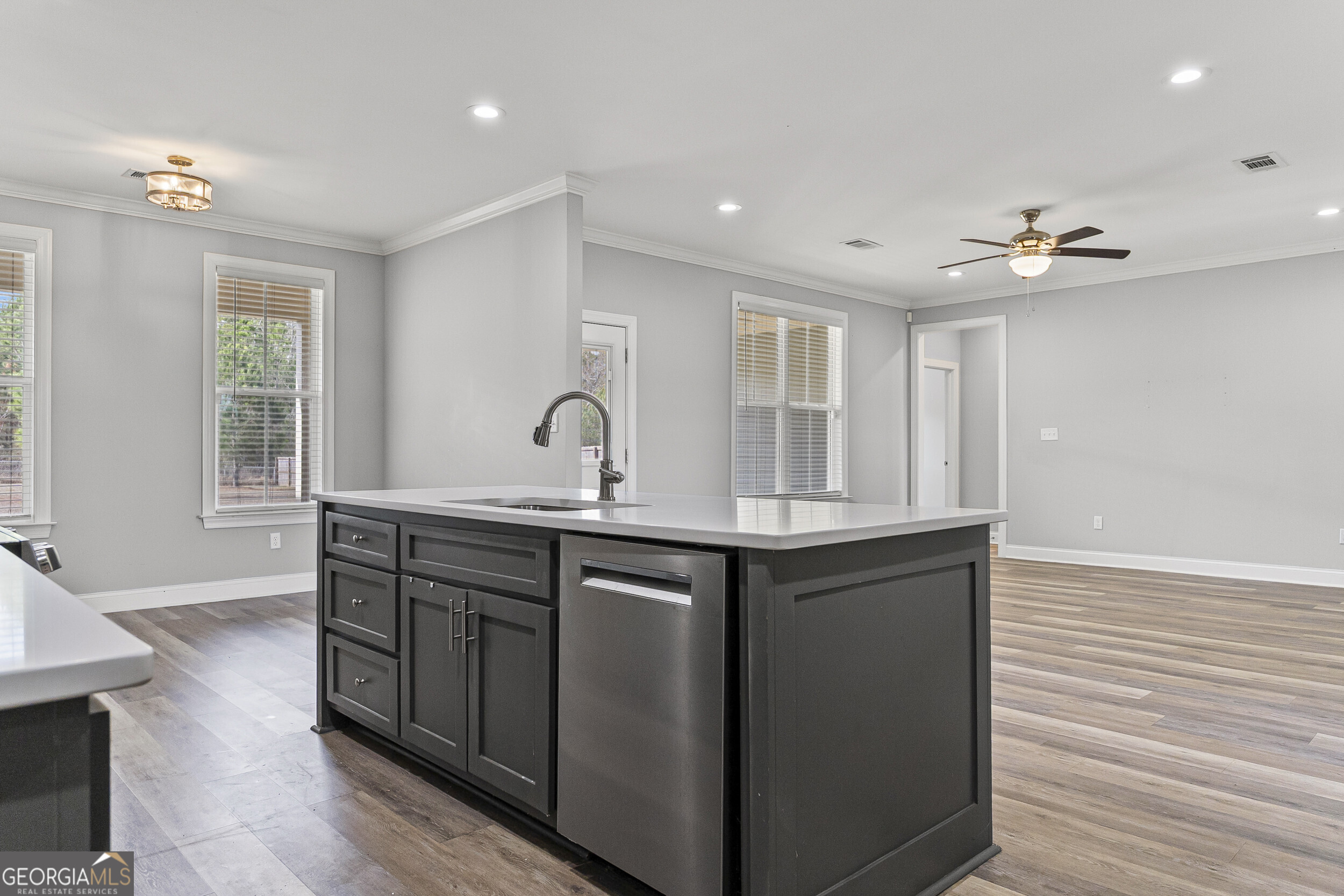 144 Scarlet Way Leesburg, GA 31763 - Photo 11 of 30 a kitchen with counter top space and windows