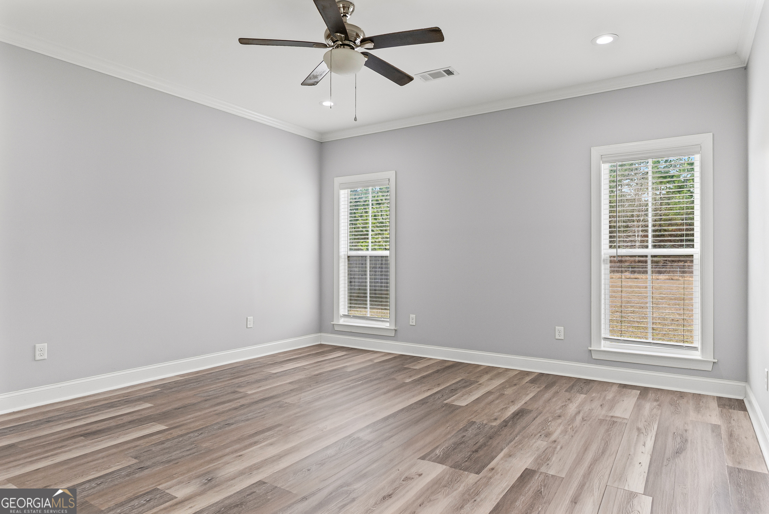 144 Scarlet Way Leesburg, GA 31763 - Photo 15 of 30 wooden floor in an empty room with a window