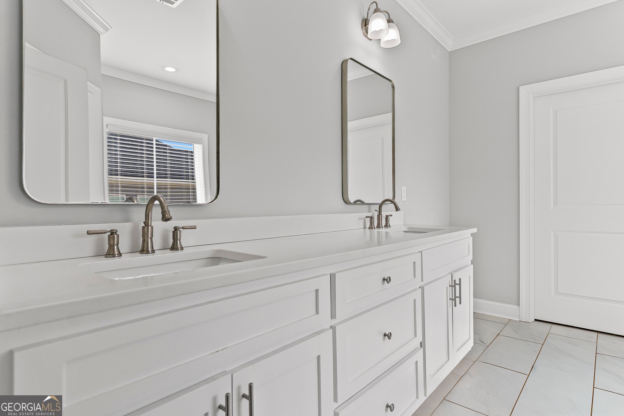 144 Scarlet Way Leesburg, GA 31763 - Photo 17 of 30 a bathroom with a double vanity sink and a mirror