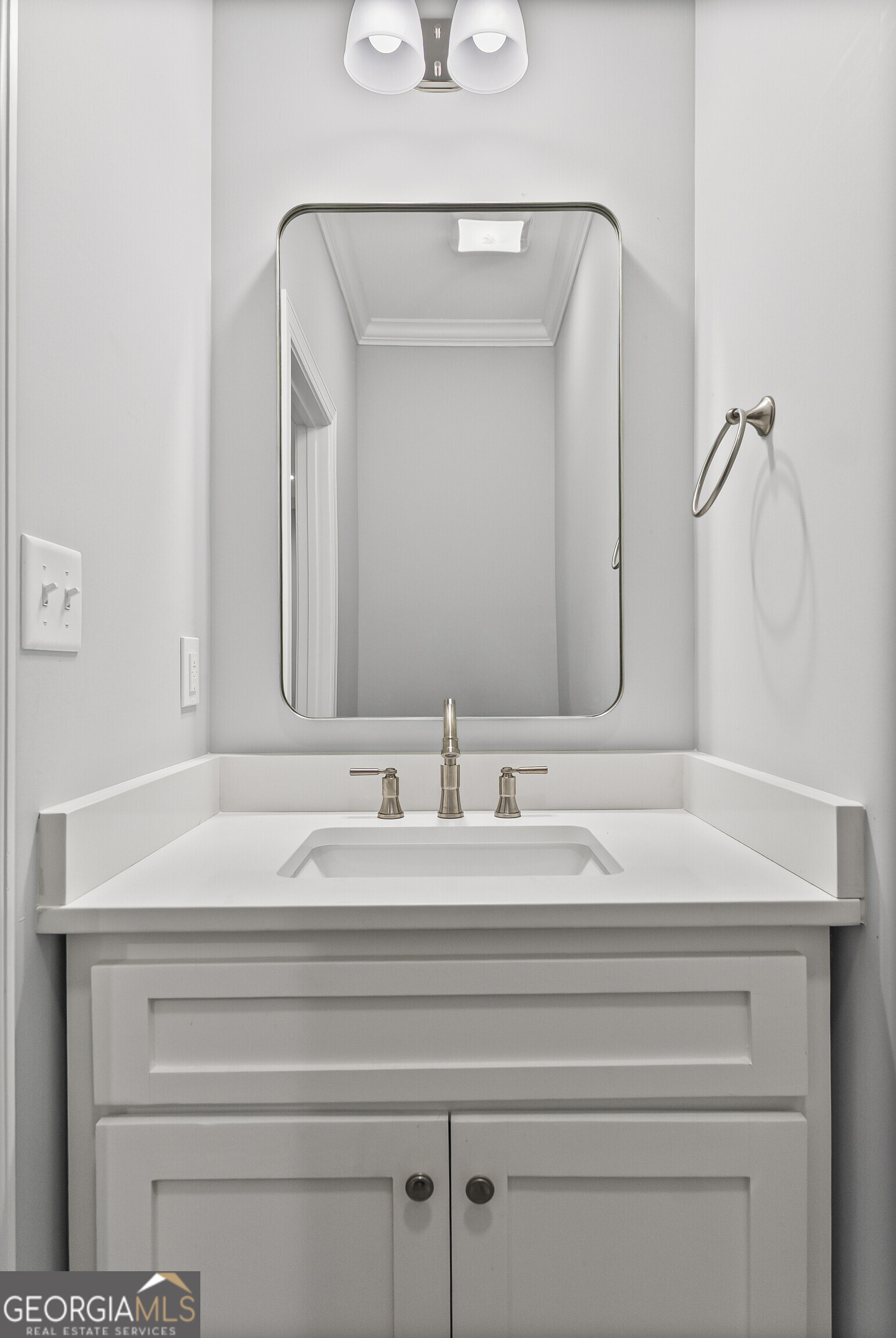 144 Scarlet Way Leesburg, GA 31763 - Photo 21 of 30 a bathroom with a sink and a mirror