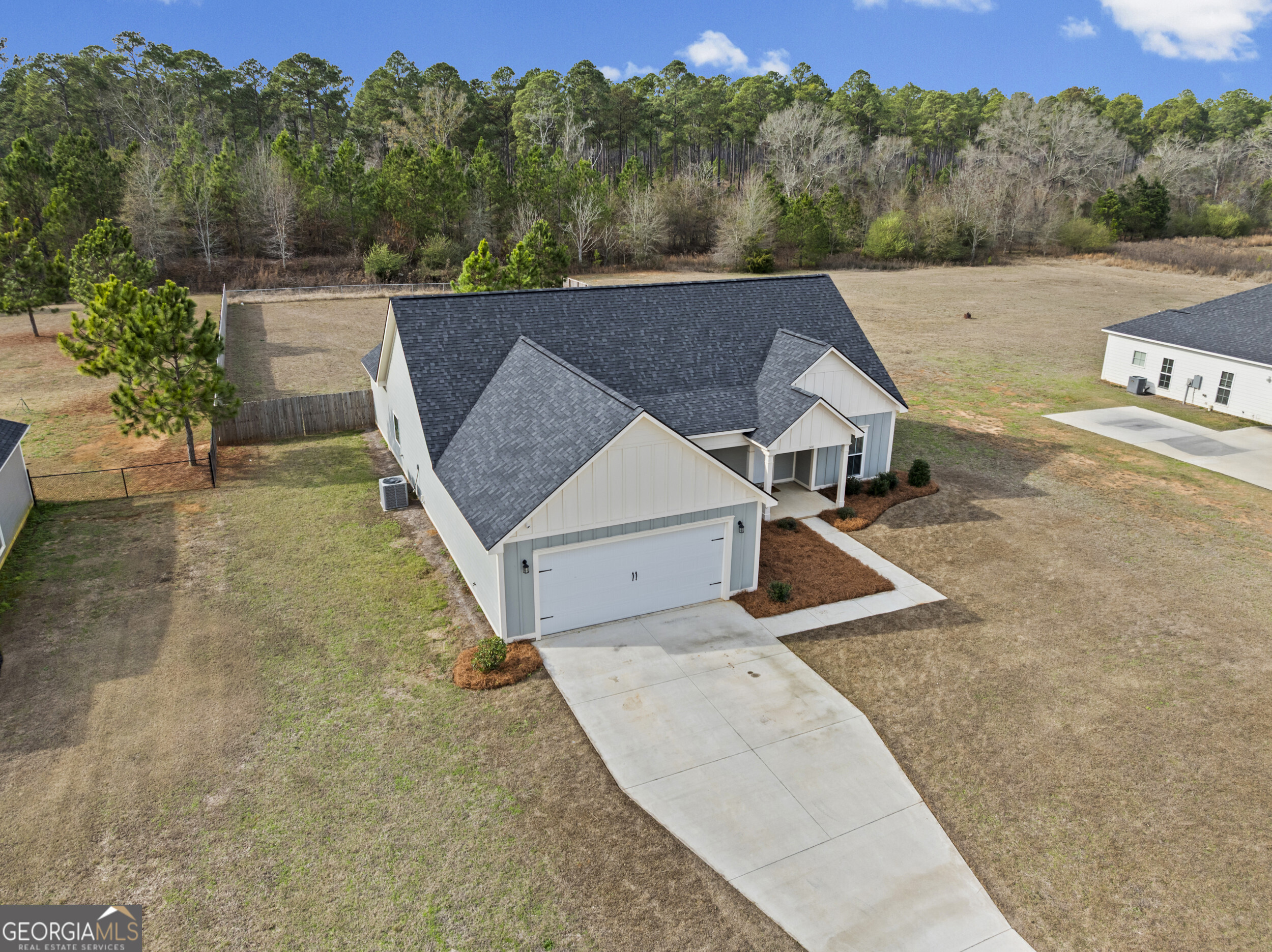144 Scarlet Way Leesburg, GA 31763 - Photo 4 of 30 an aerial view of a house with a garden