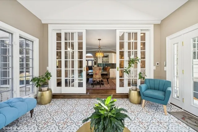 a bedroom with furniture and a book shelf