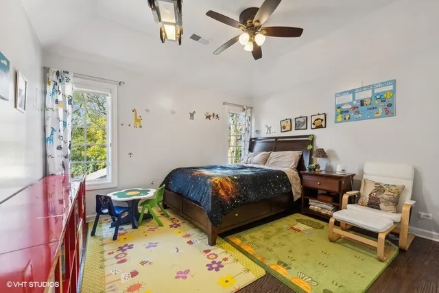 a bathroom with a sink a mirror and shower