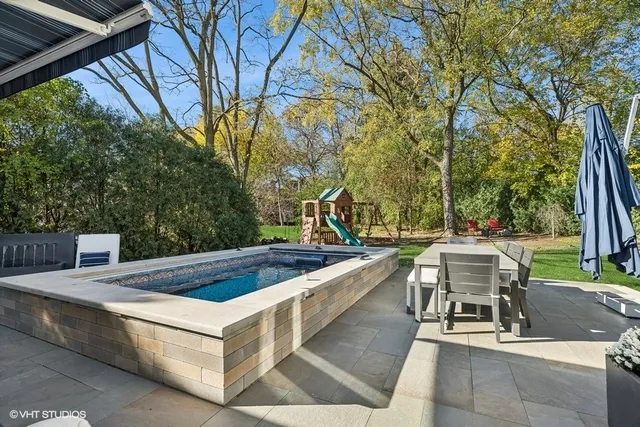 a picture of a bathroom with a shower