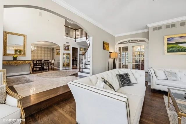 a living room with furniture and a table